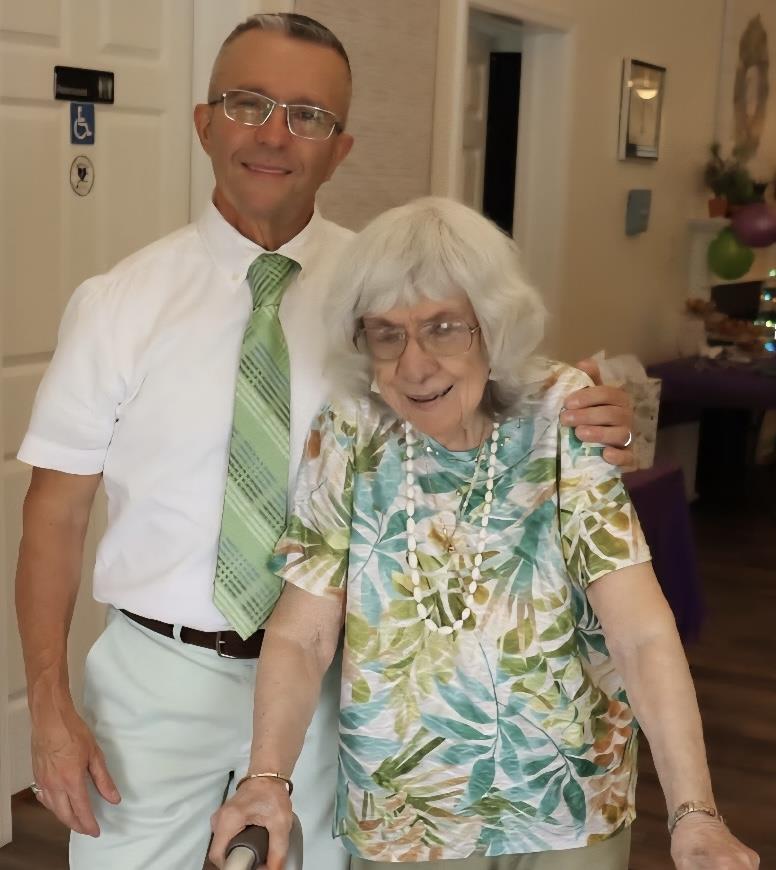 A man and woman posing for a picture