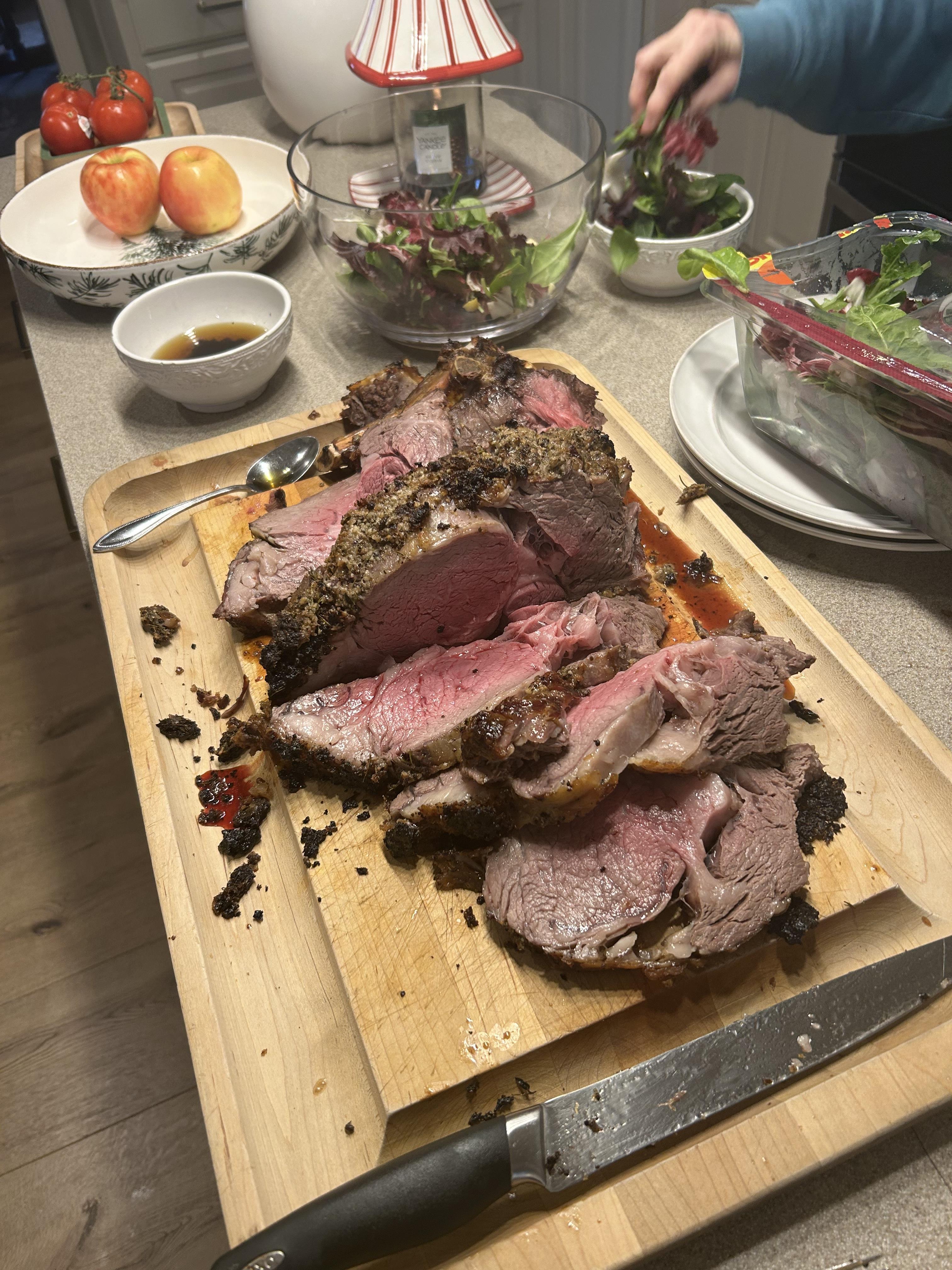 A cutting board with meat on it