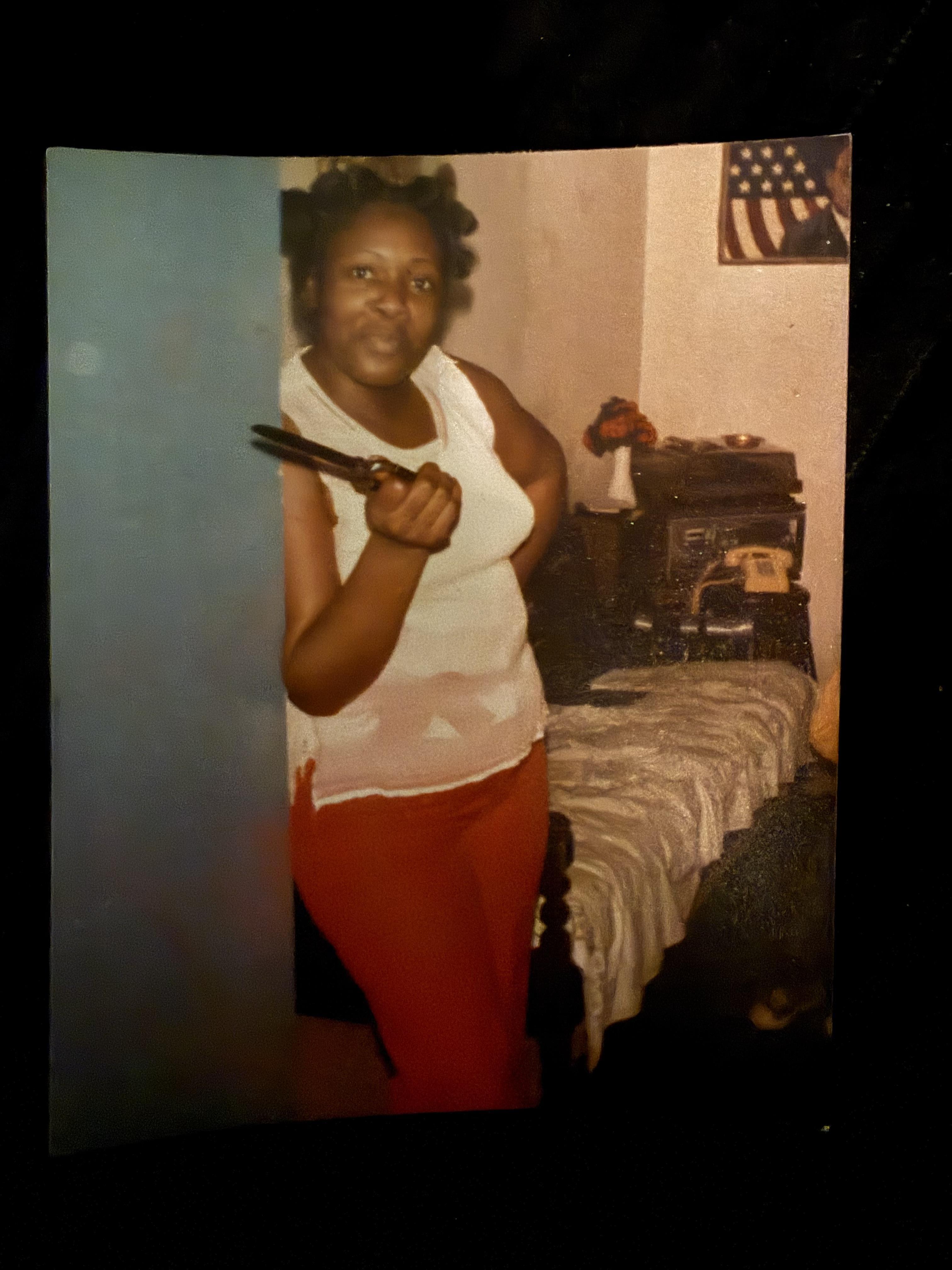 A woman holding a pair of scissors