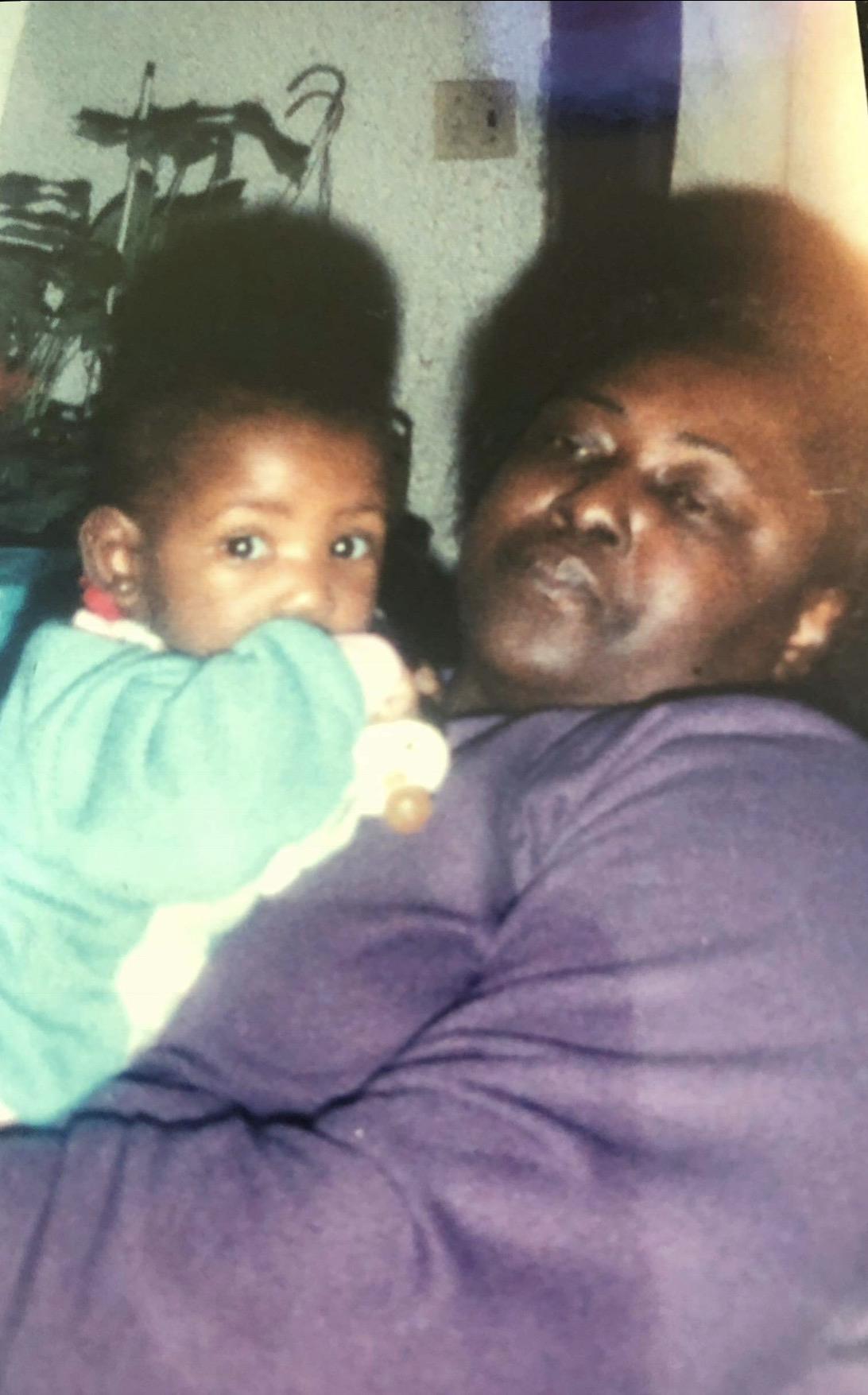 A woman holding a baby