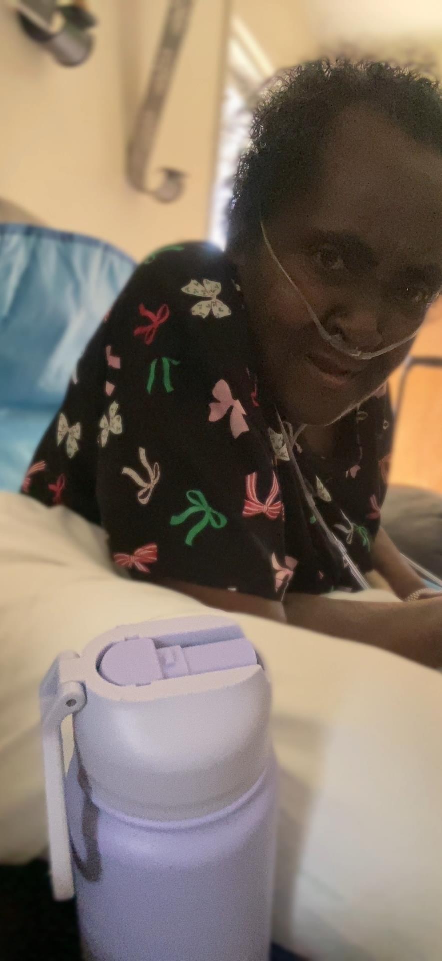 A person in a hospital bed