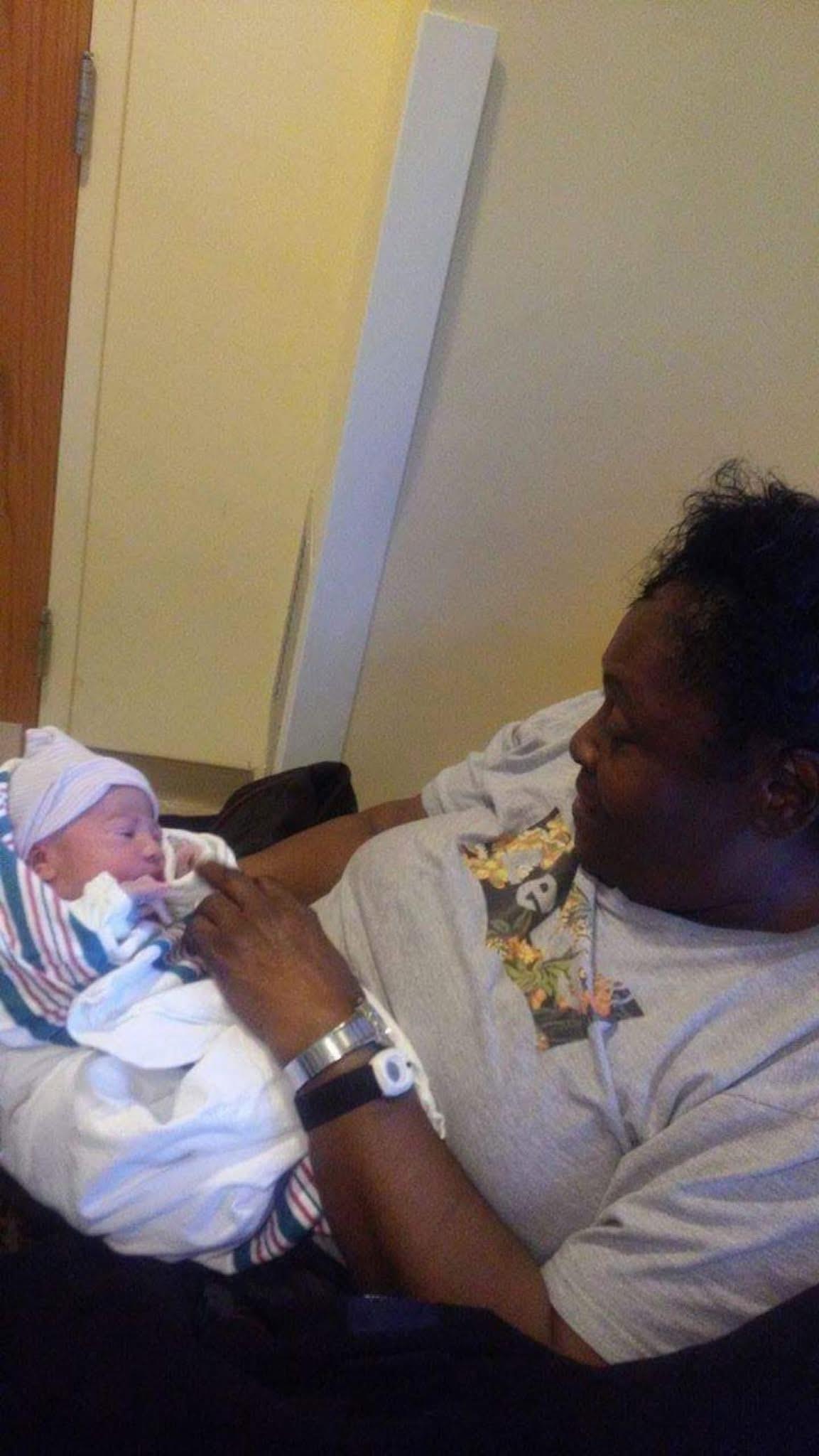 A woman holding a baby