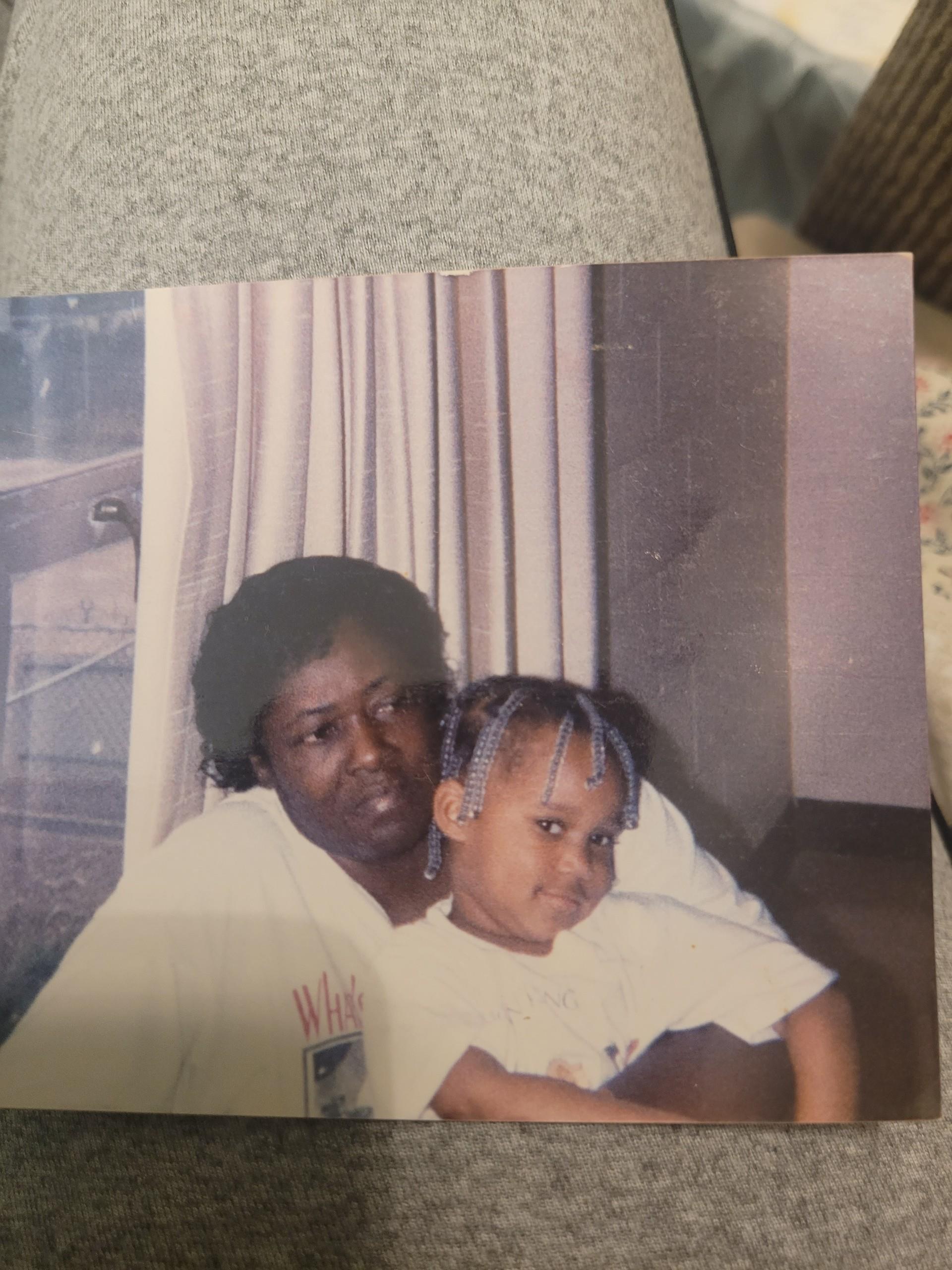 A man and a child posing for a picture