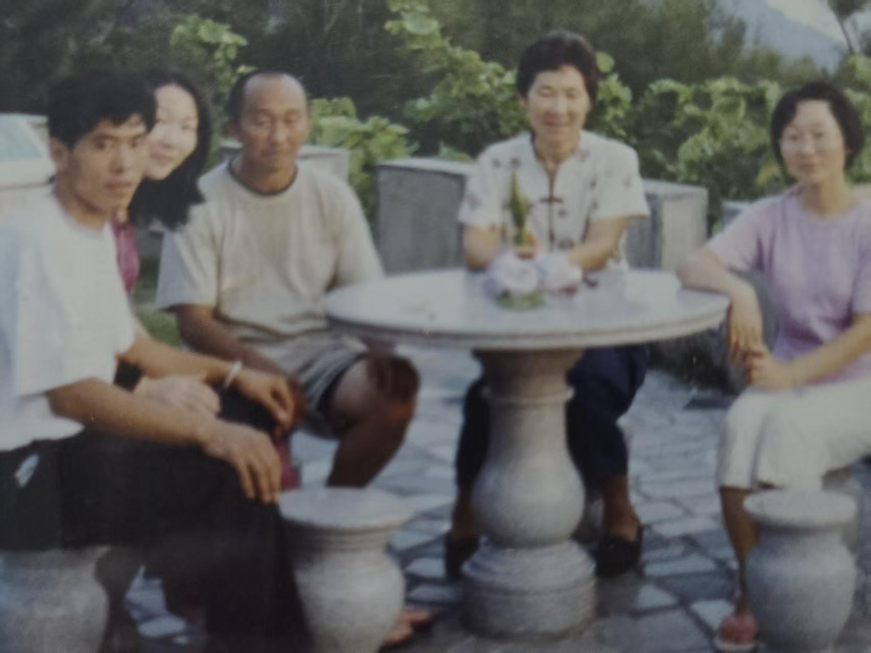 A group of people sitting at a table