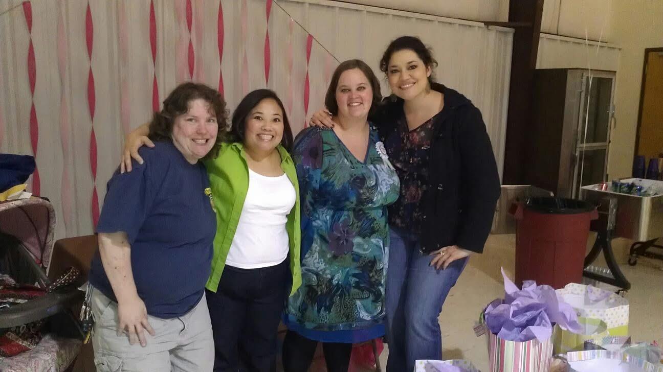 A group of women posing for a photo