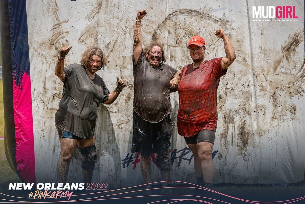 A group of people in mud