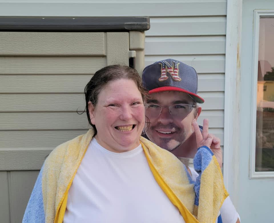 A man and woman posing for a picture