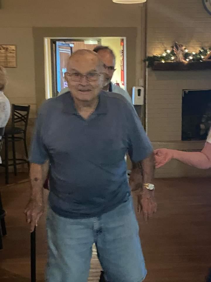 A man in a blue shirt