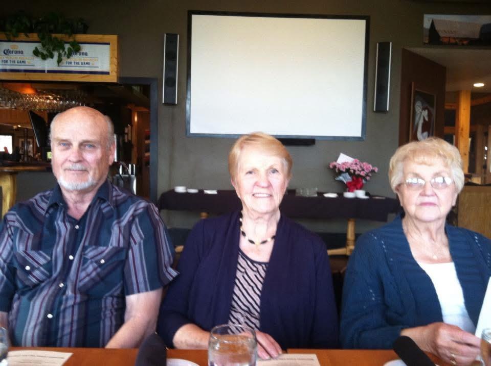 A group of people sitting at a table
