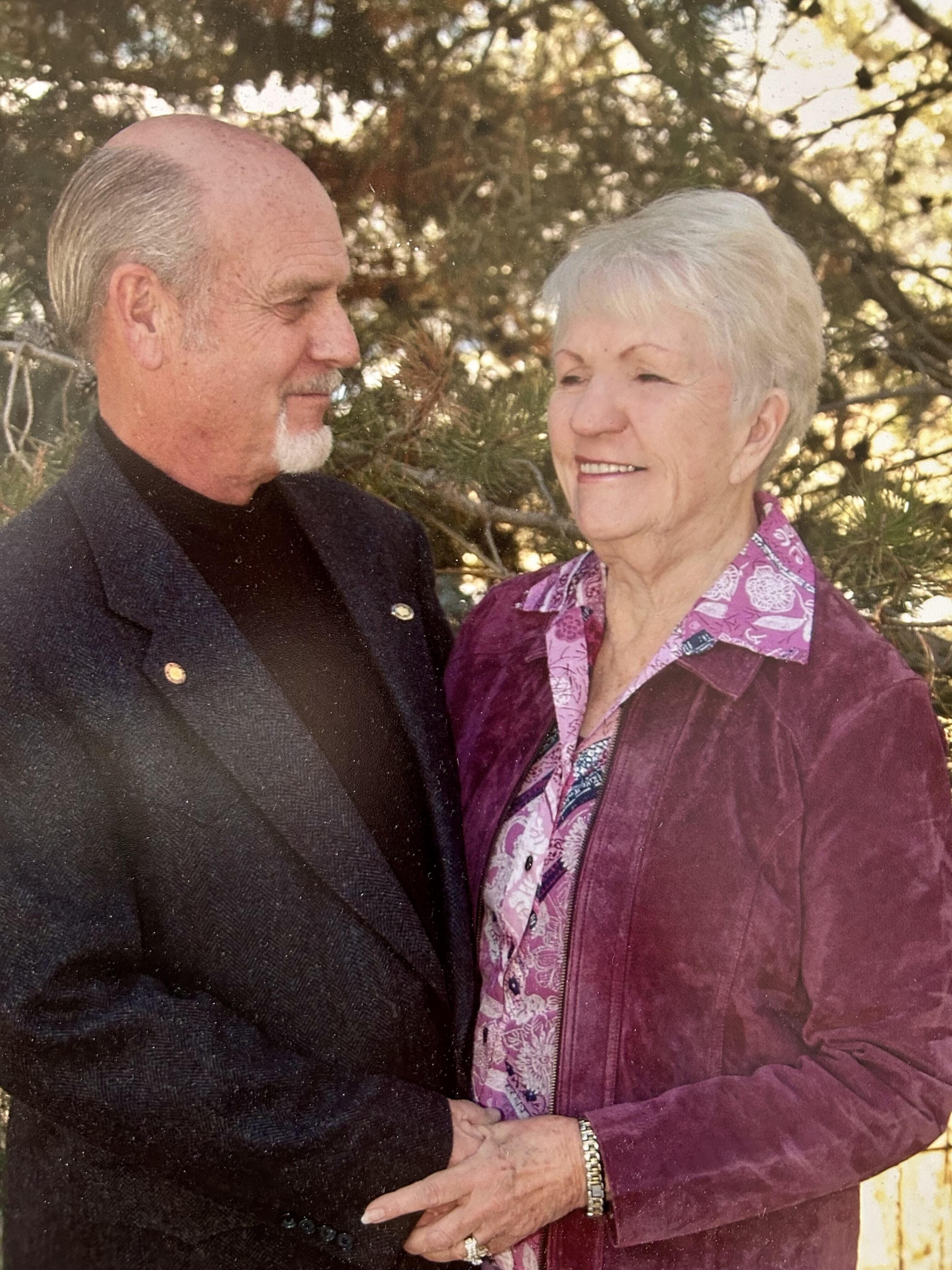 A man and woman holding hands