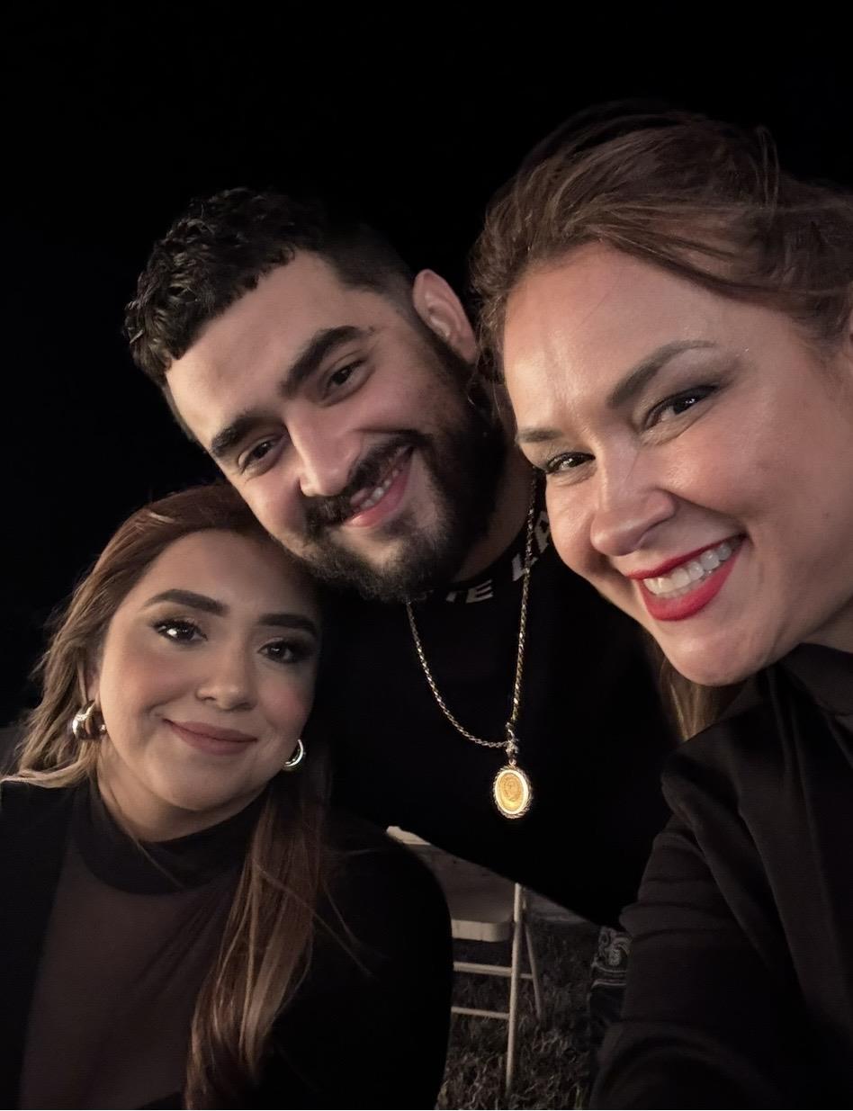 A group of people posing for a selfie