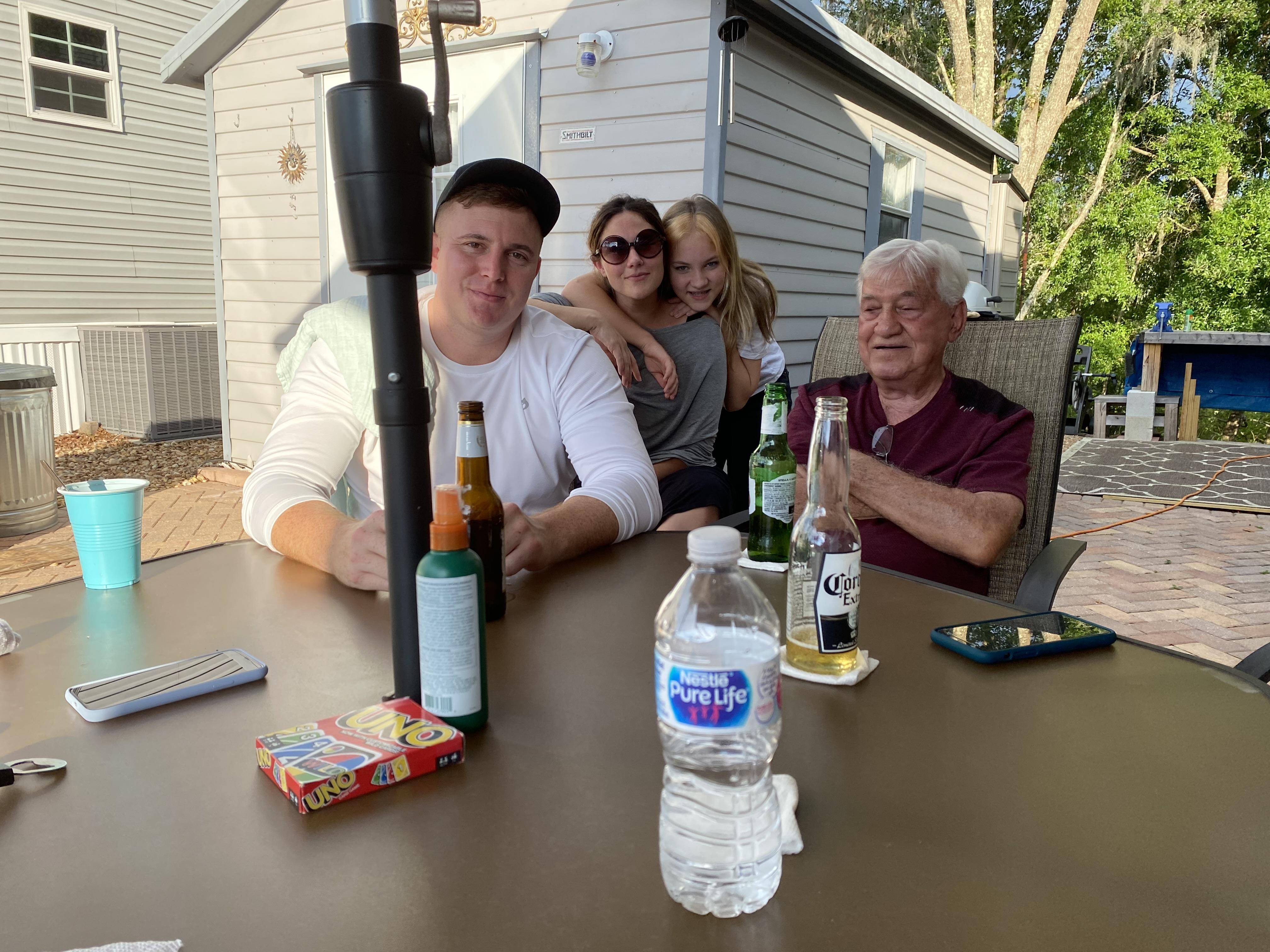 A group of people sitting at a table