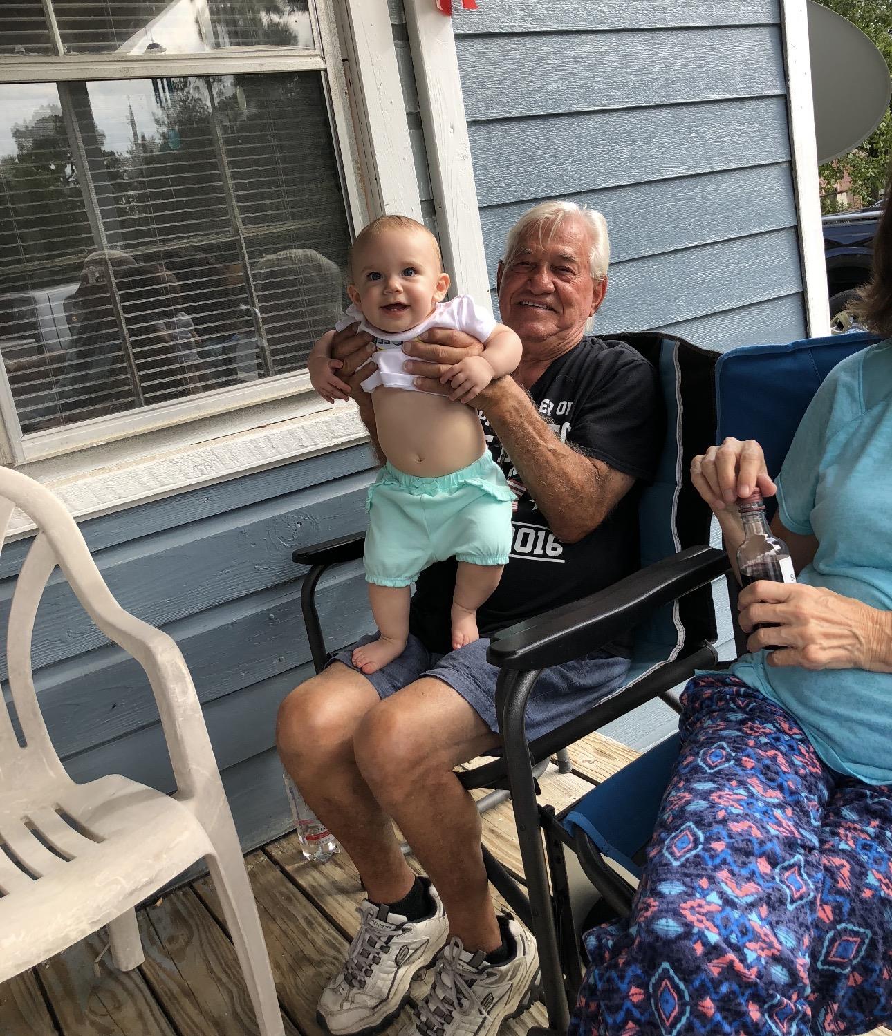 A man holding a baby