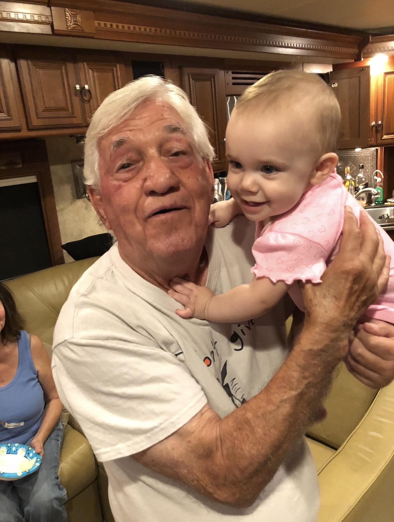 A man holding a baby
