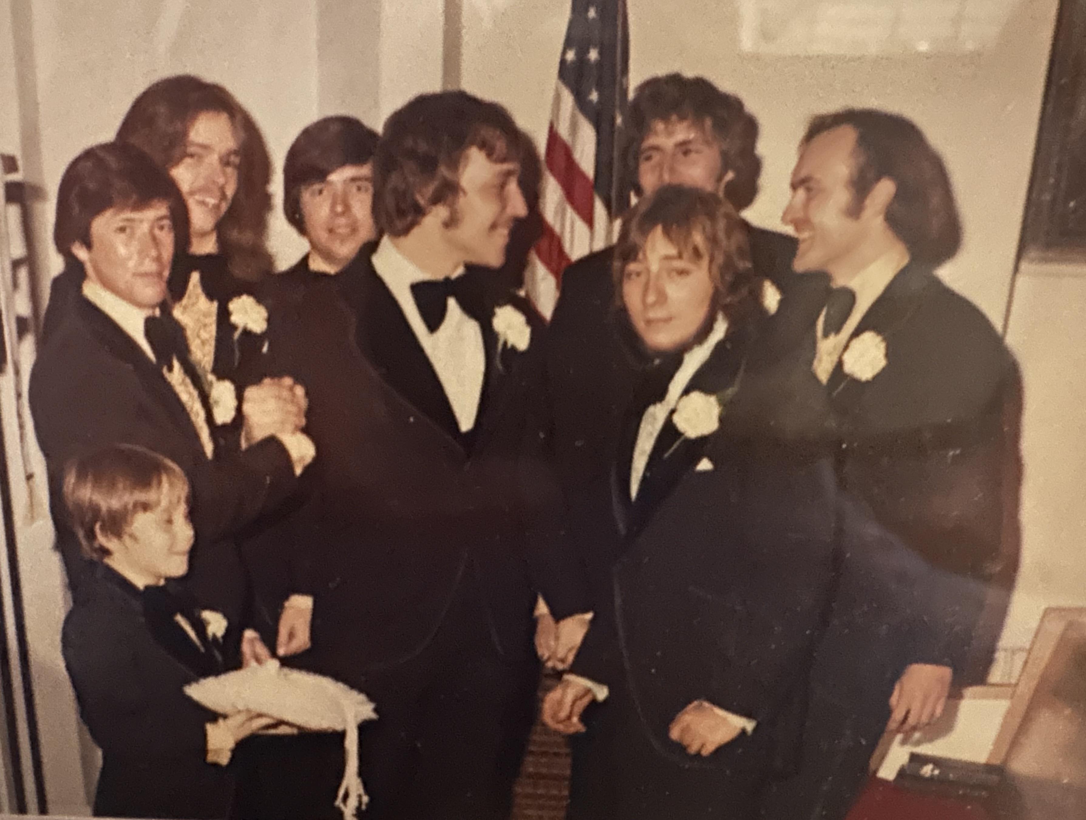 A group of people in suits