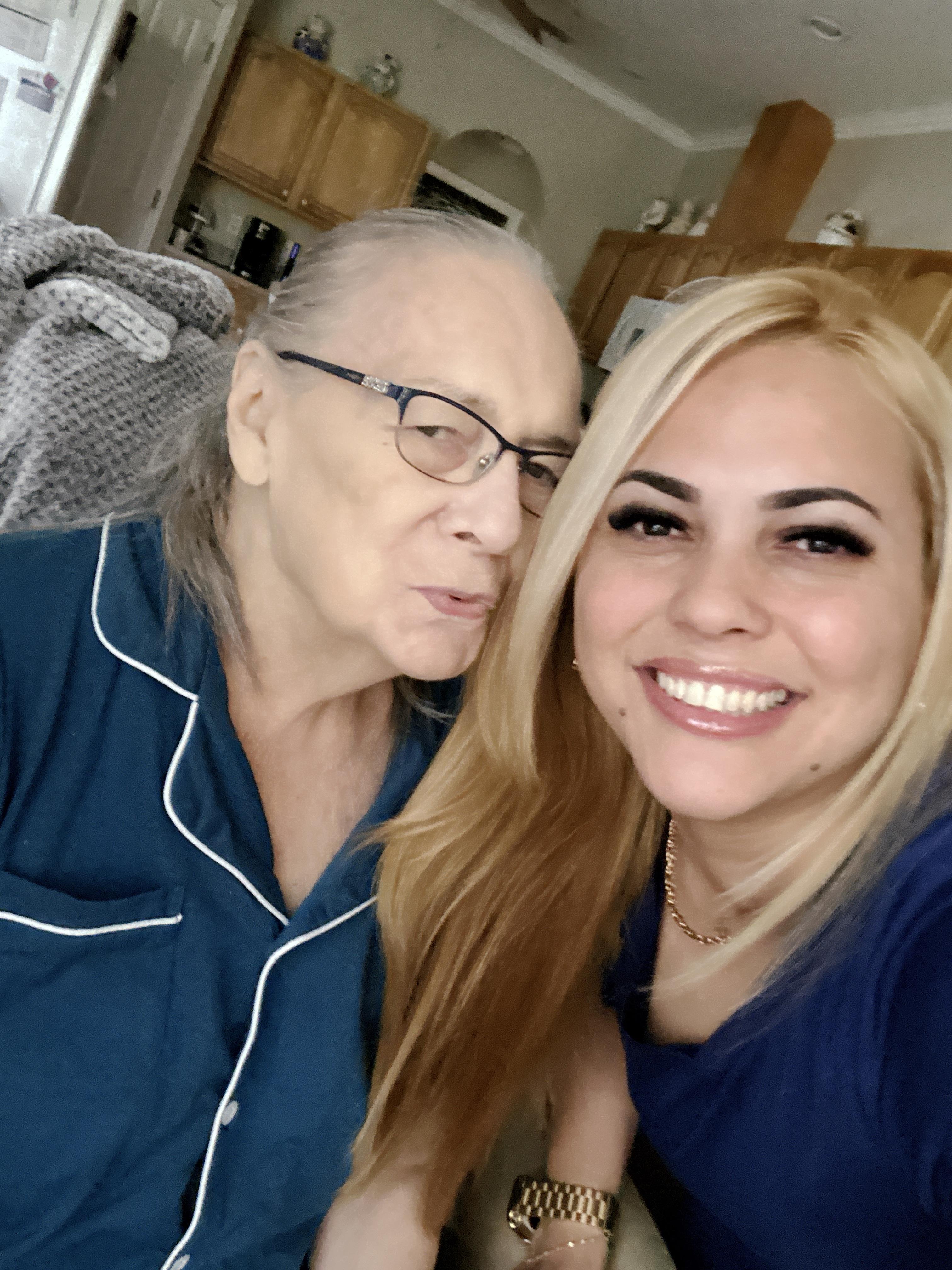 A woman and man taking a selfie