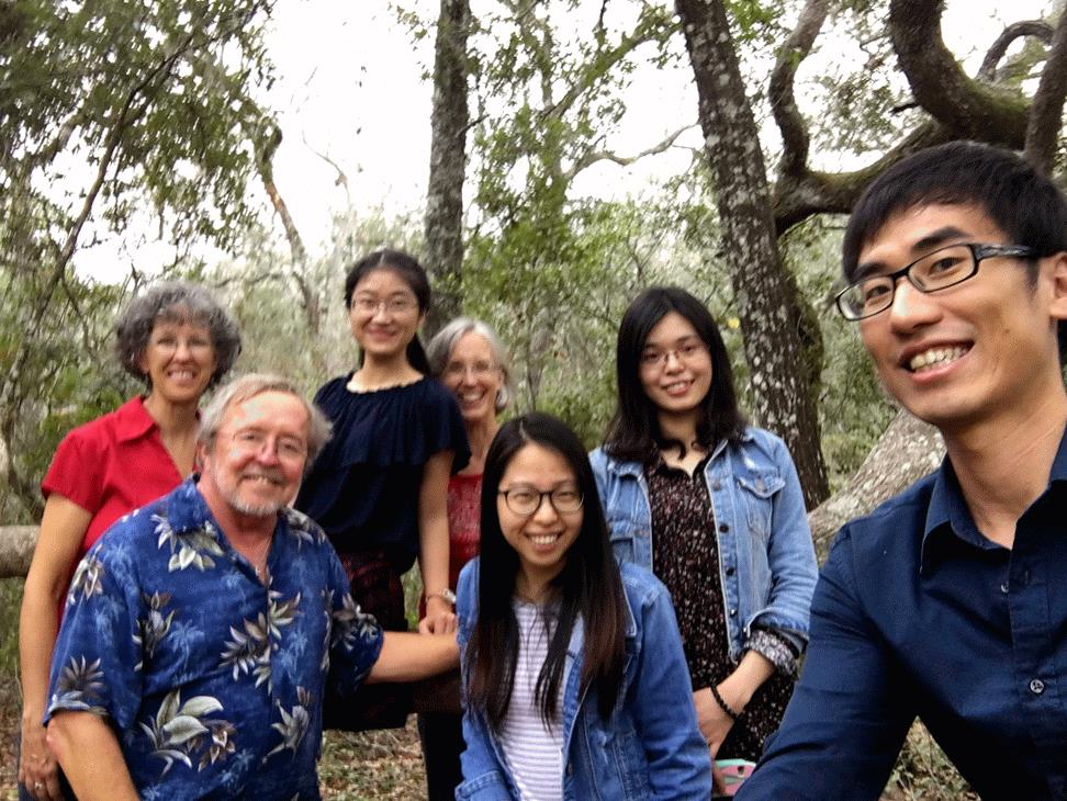 A group of people posing for a photo