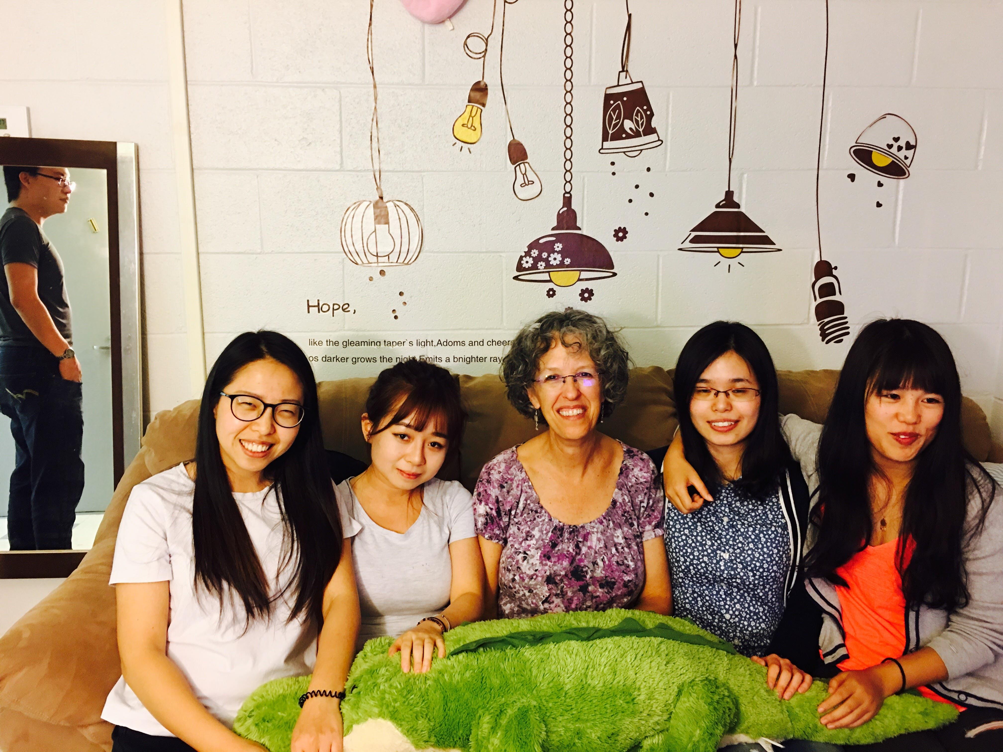 A group of women sitting on a couch