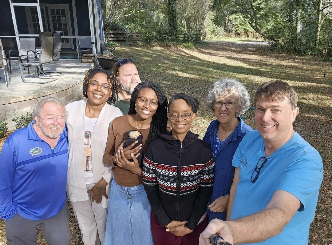 A group of people posing for a photo