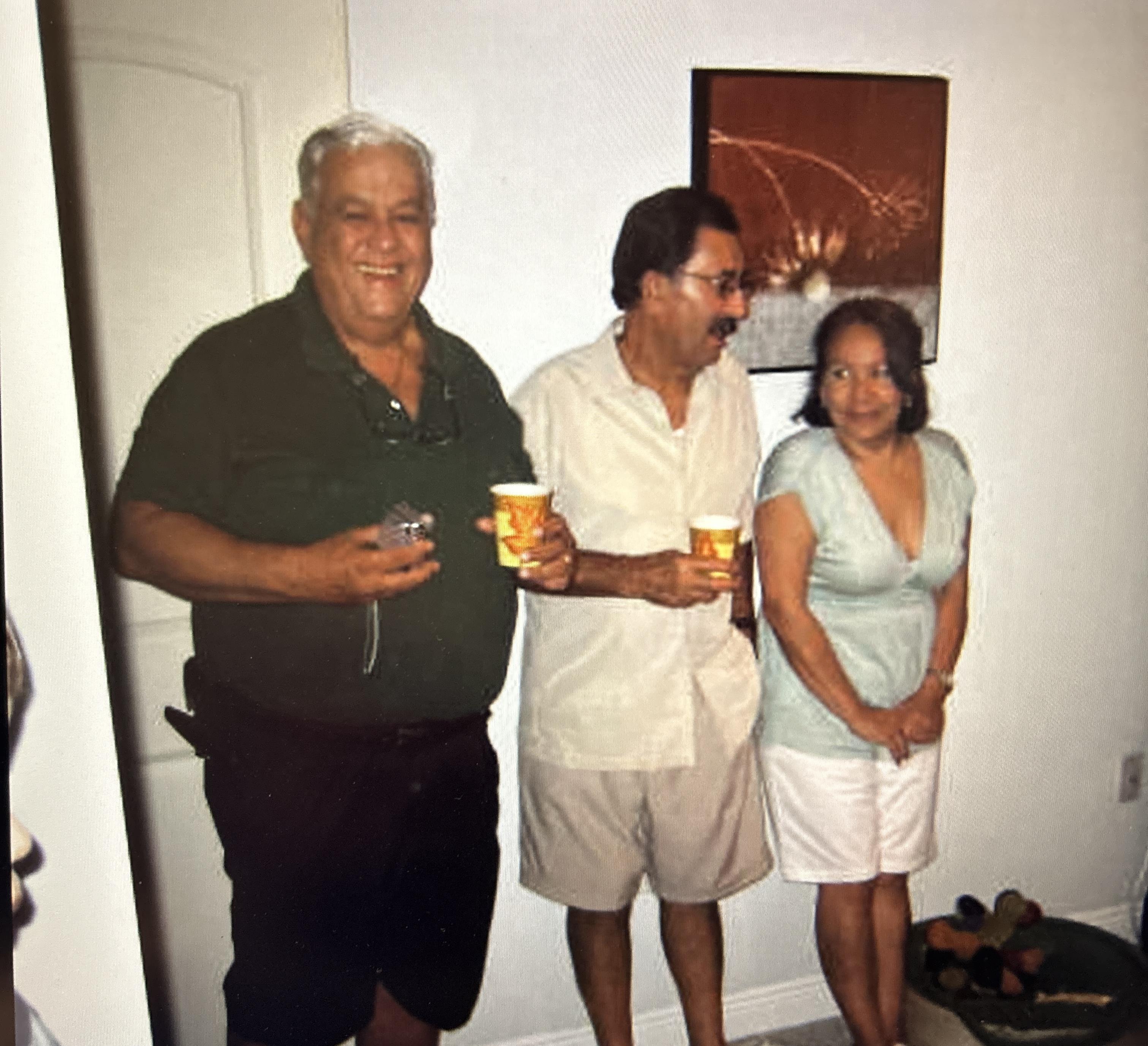 A group of people standing in a room