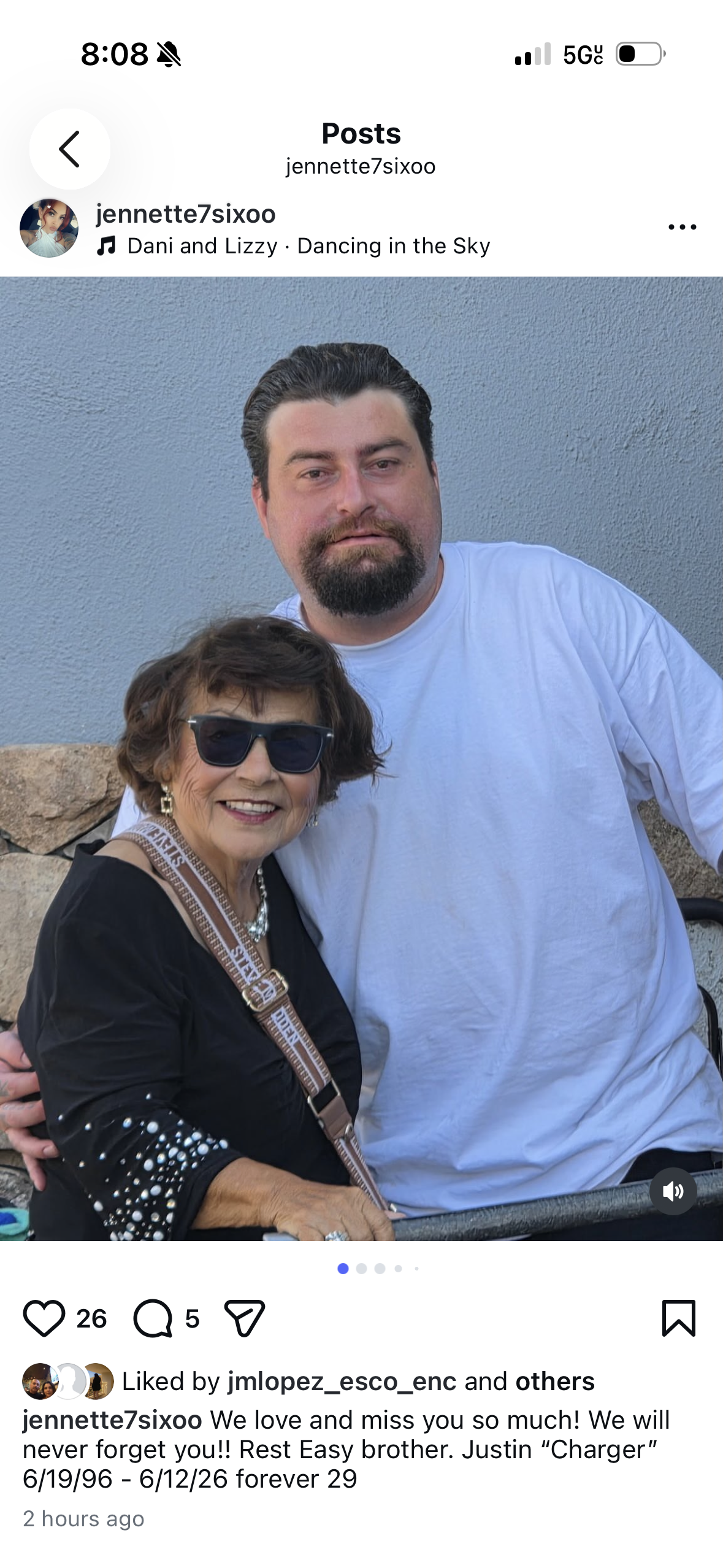 A man and woman posing for a picture