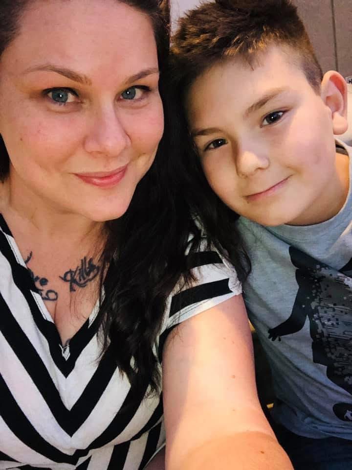 A woman and boy taking a selfie