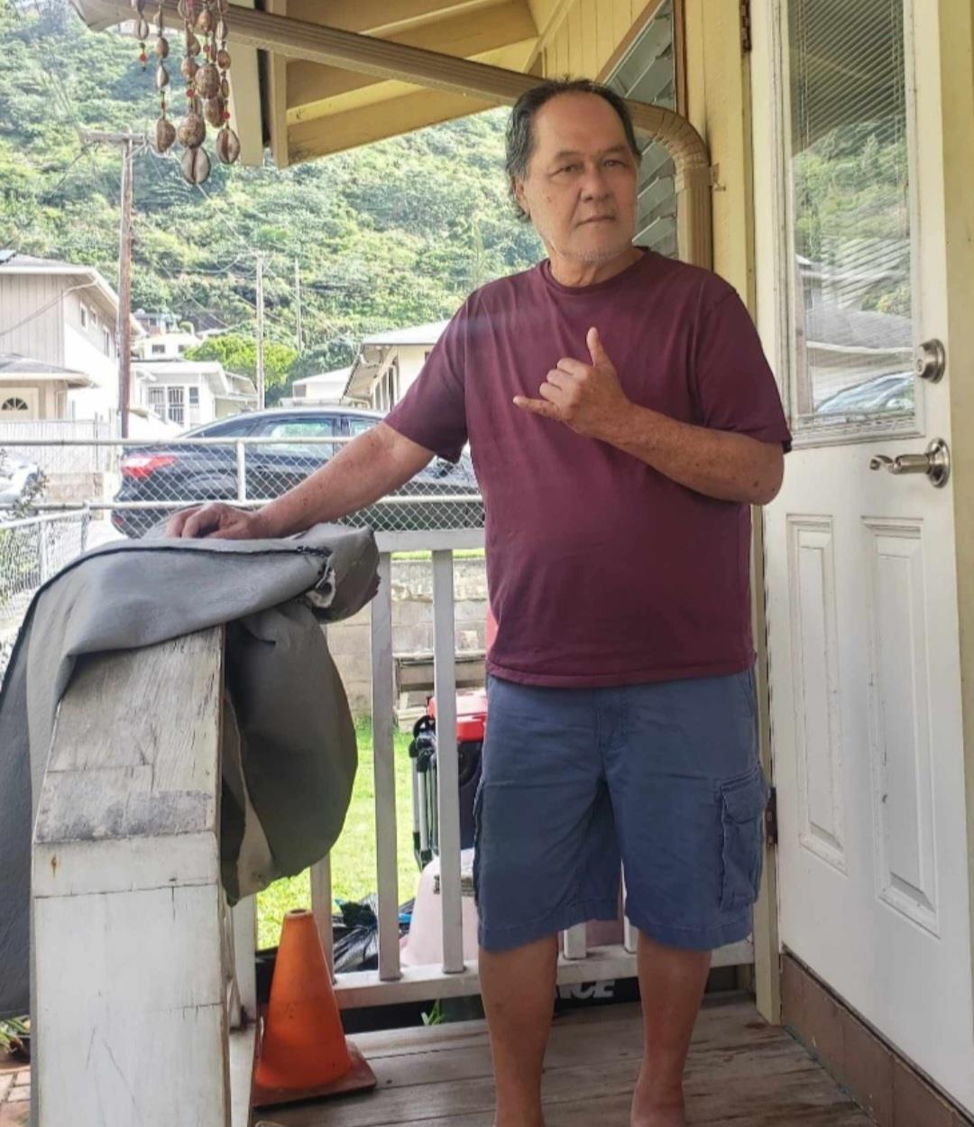 A man standing on a porch