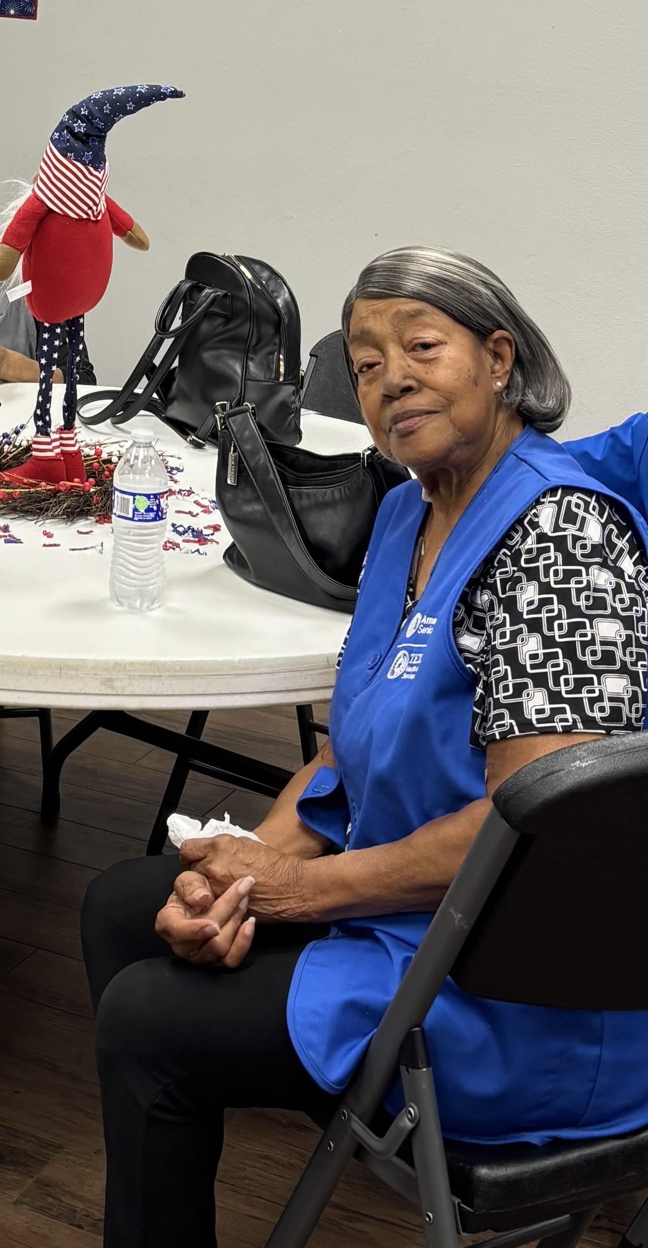 A woman sitting at a table