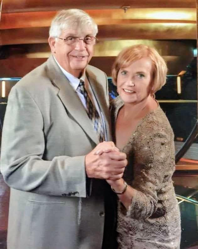 A man and woman holding hands