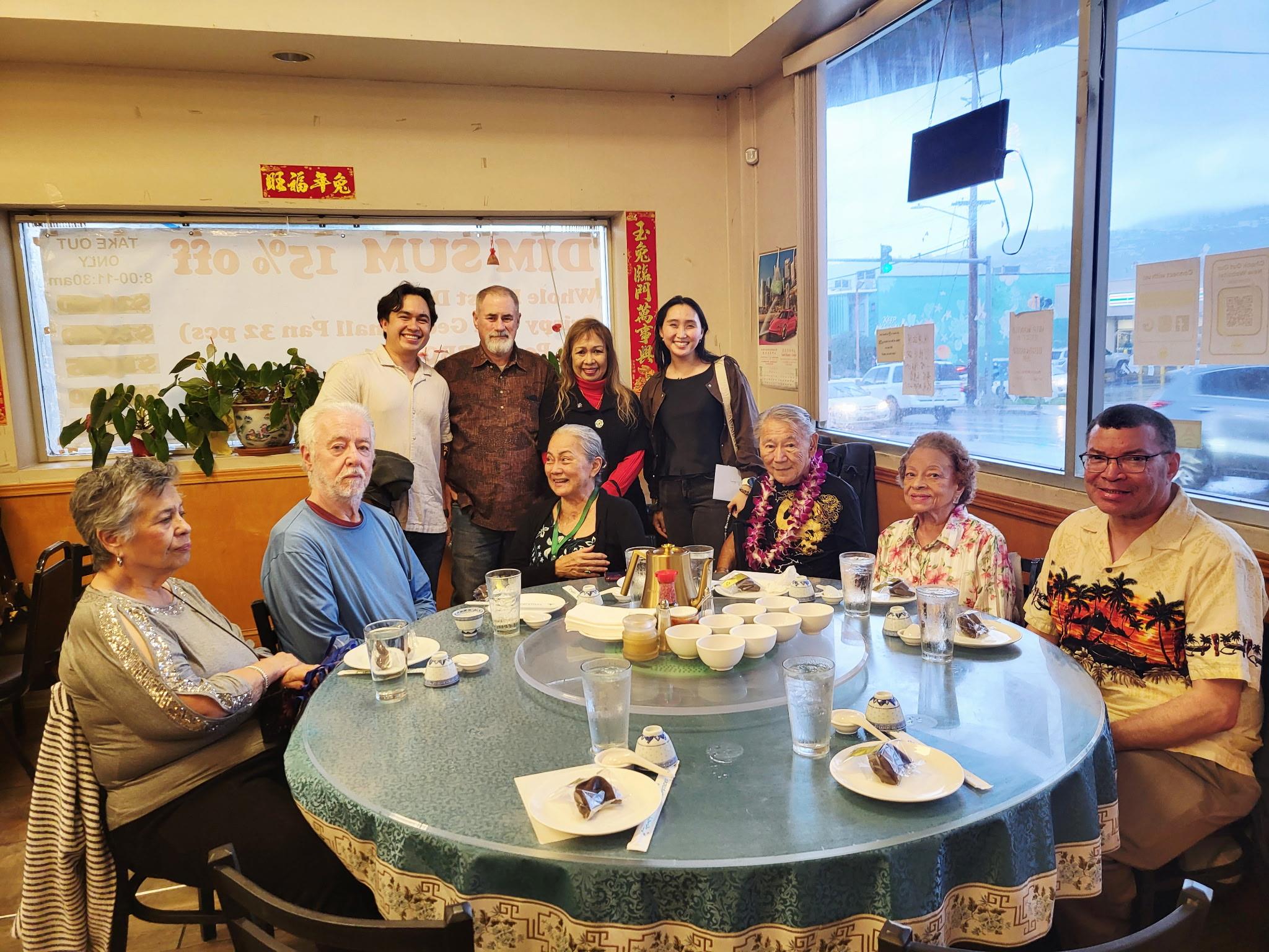 A group of people around a table