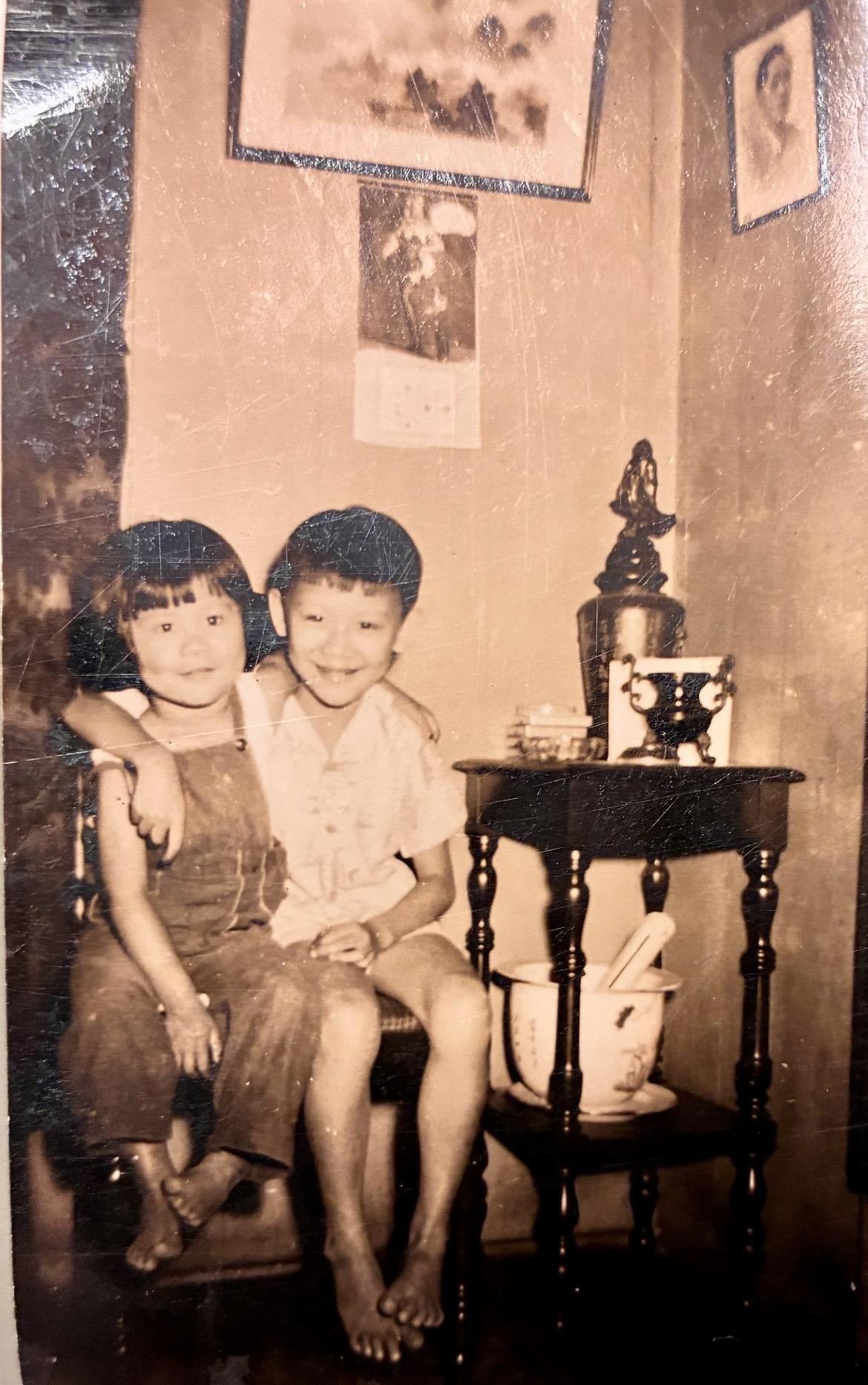 A boy and girl sitting together