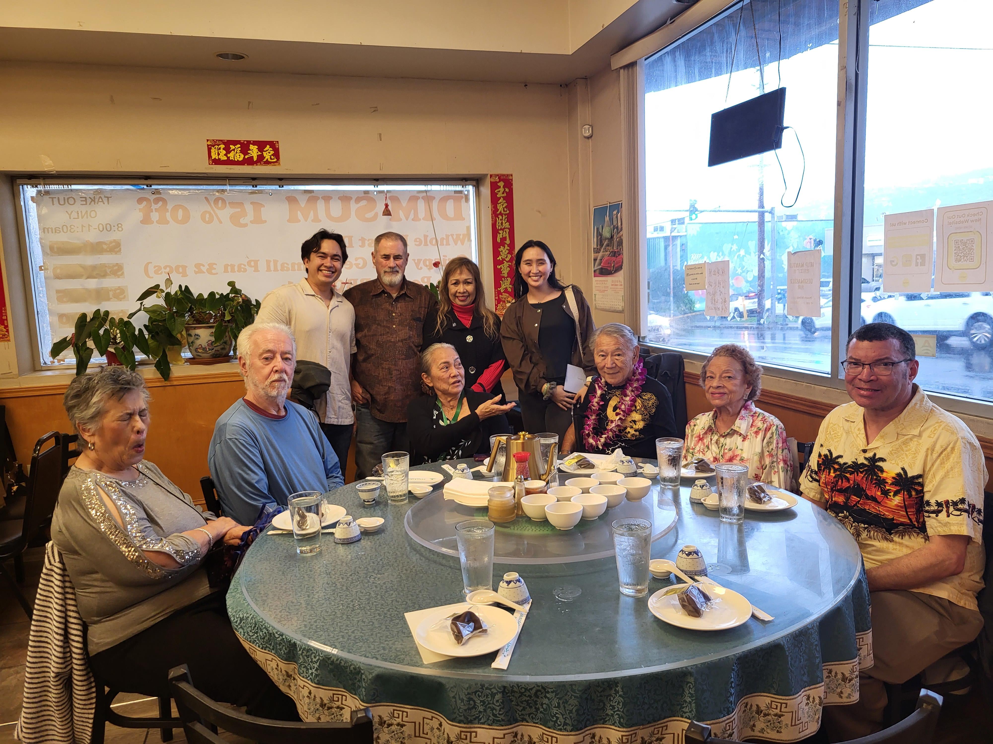 A group of people around a table
