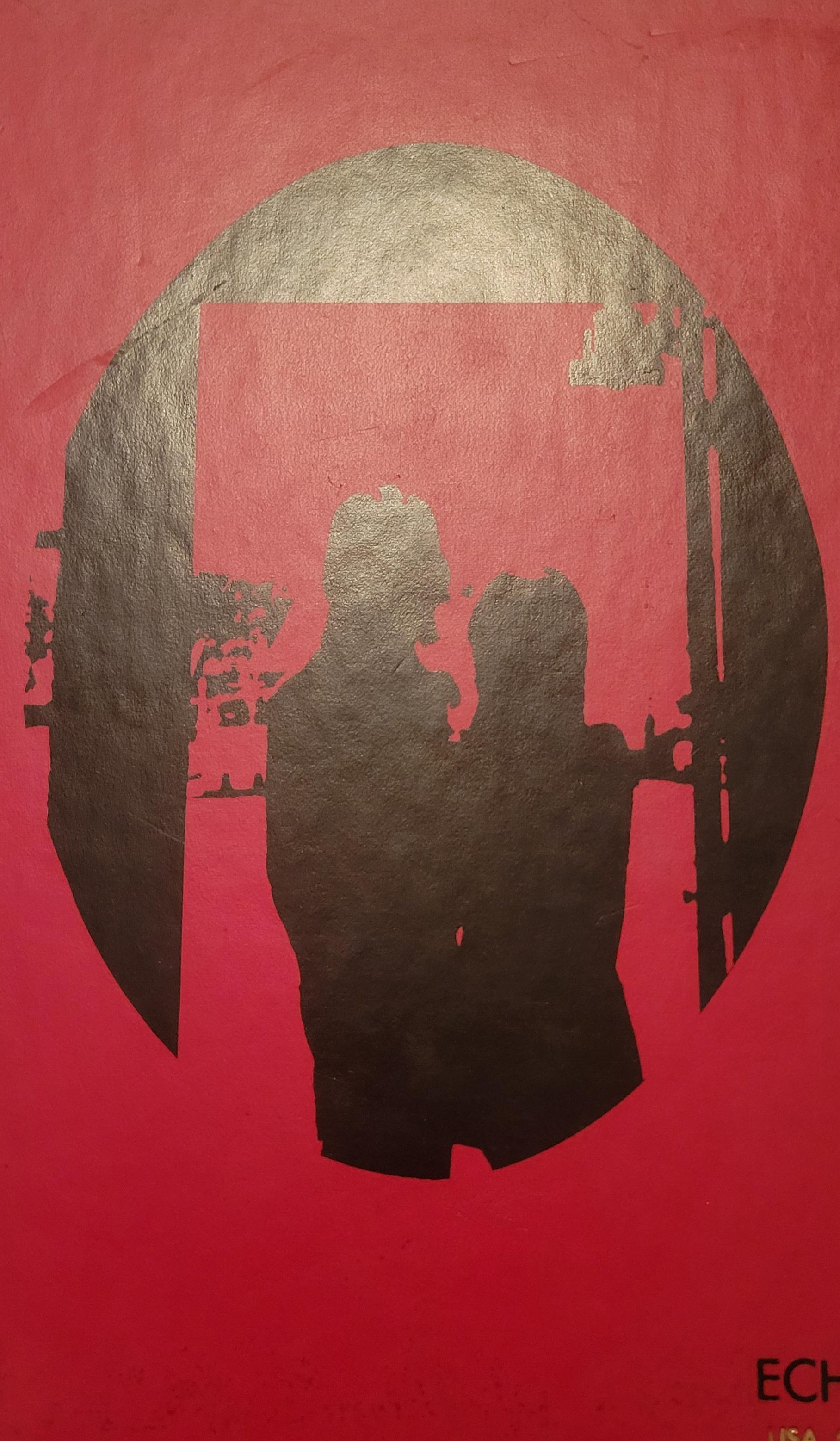 A silhouette of a man and woman