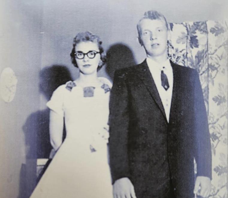 A man and woman in formal attire