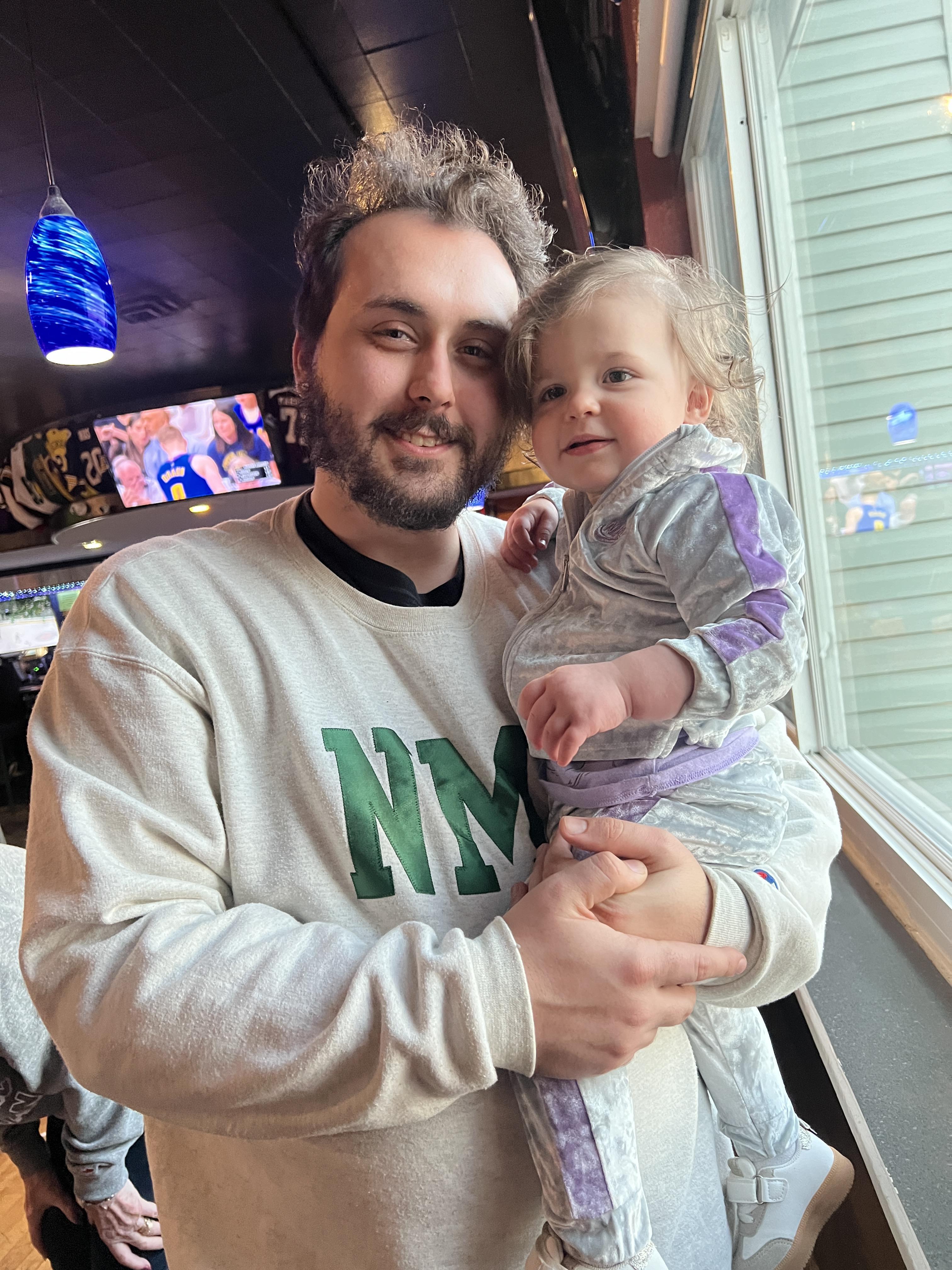 A man holding a baby
