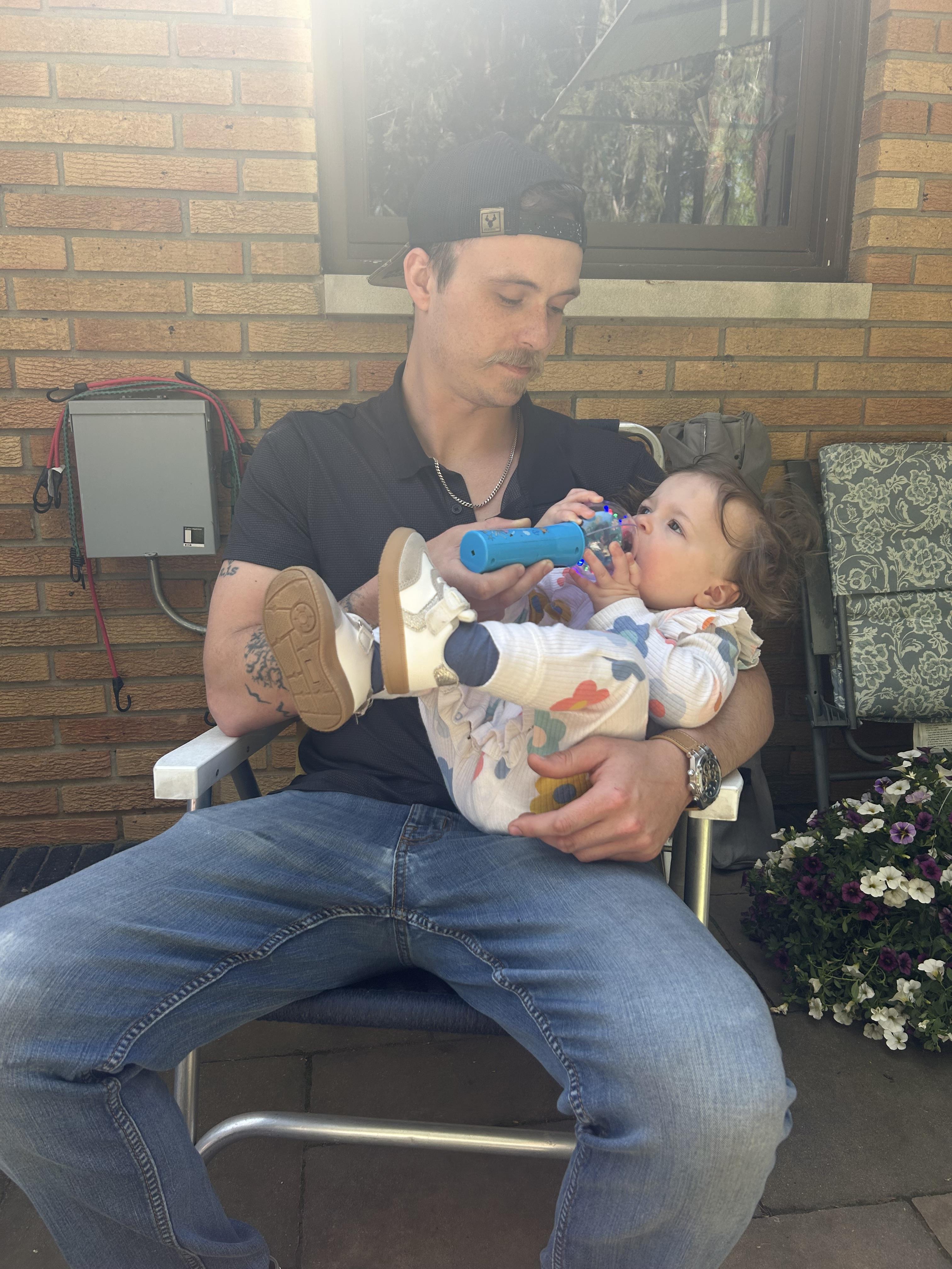 A man holding a baby