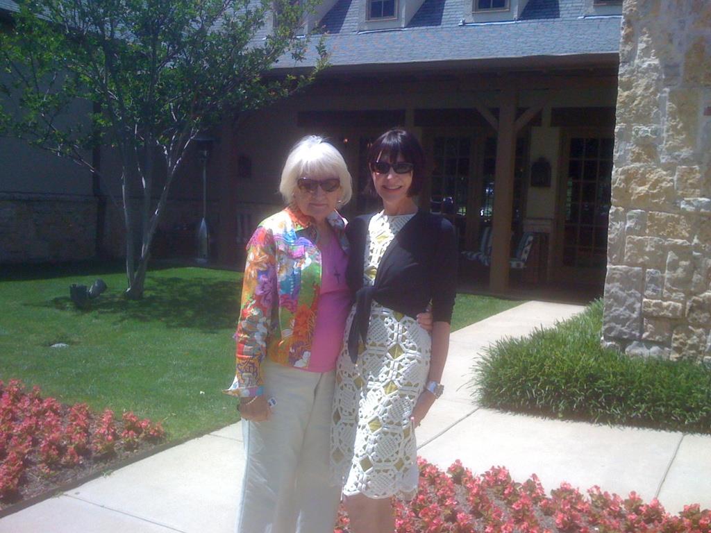 Two women standing next to each other