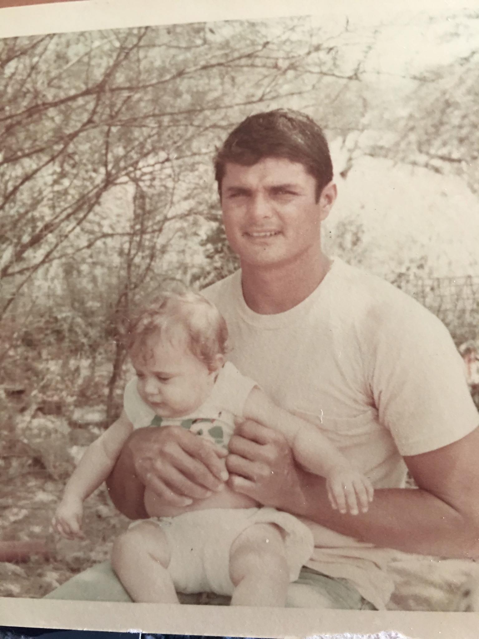 A man holding a baby