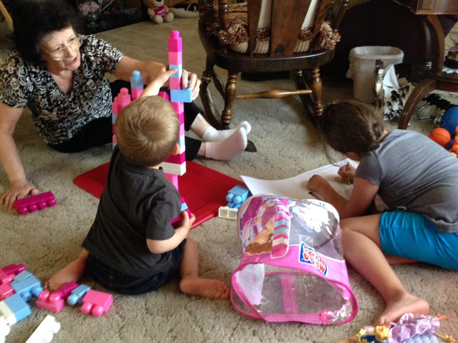 A group of kids playing with toys