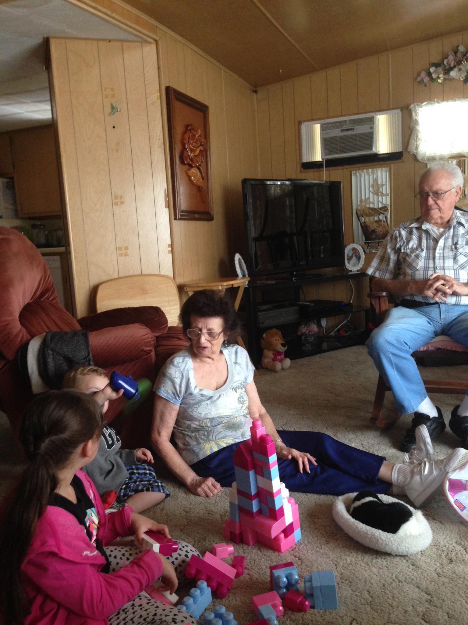 A group of people sitting on the floor