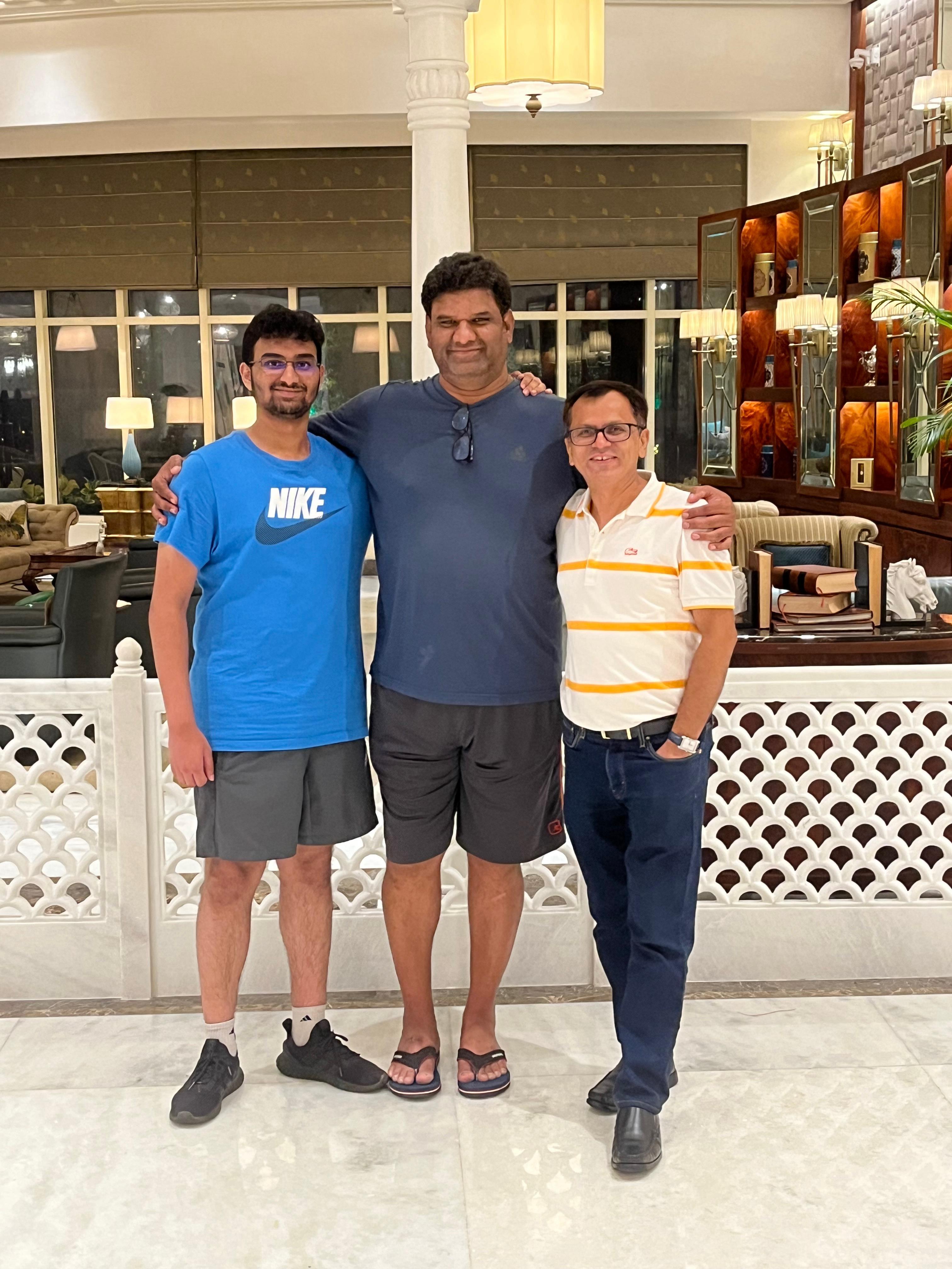 A group of men posing for a picture