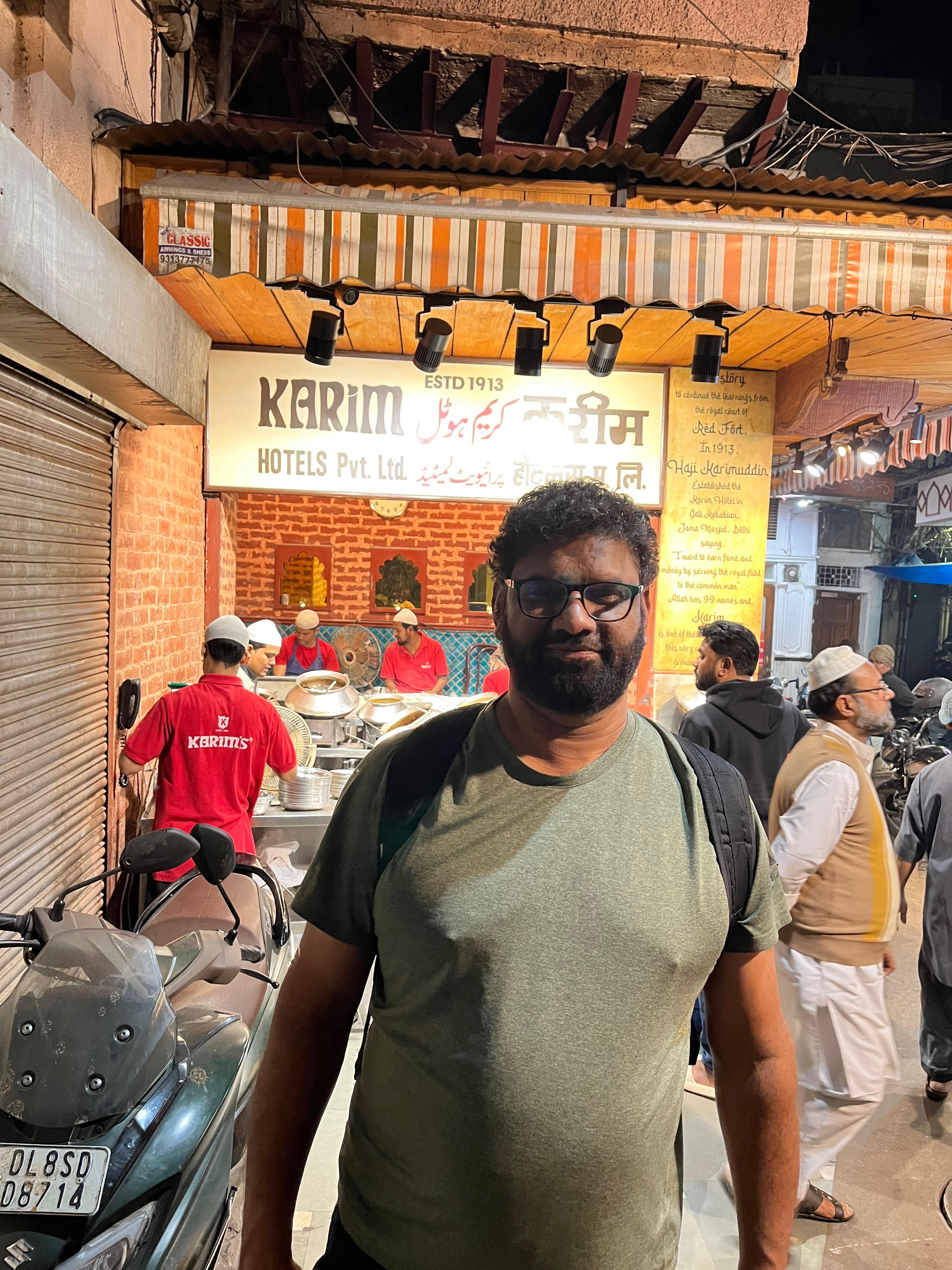A man standing in front of a store