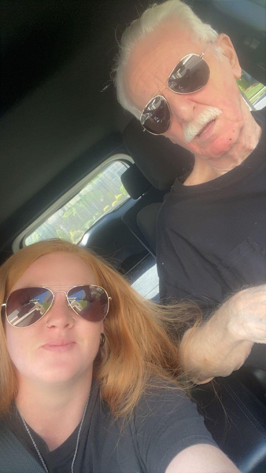 A man and woman taking a selfie