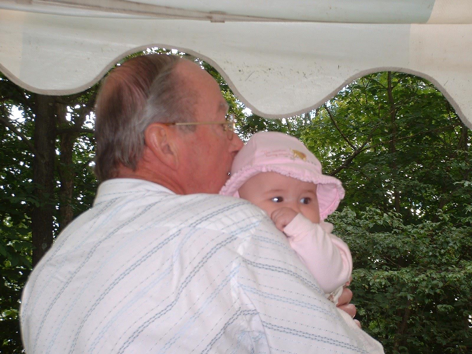 A man holding a baby