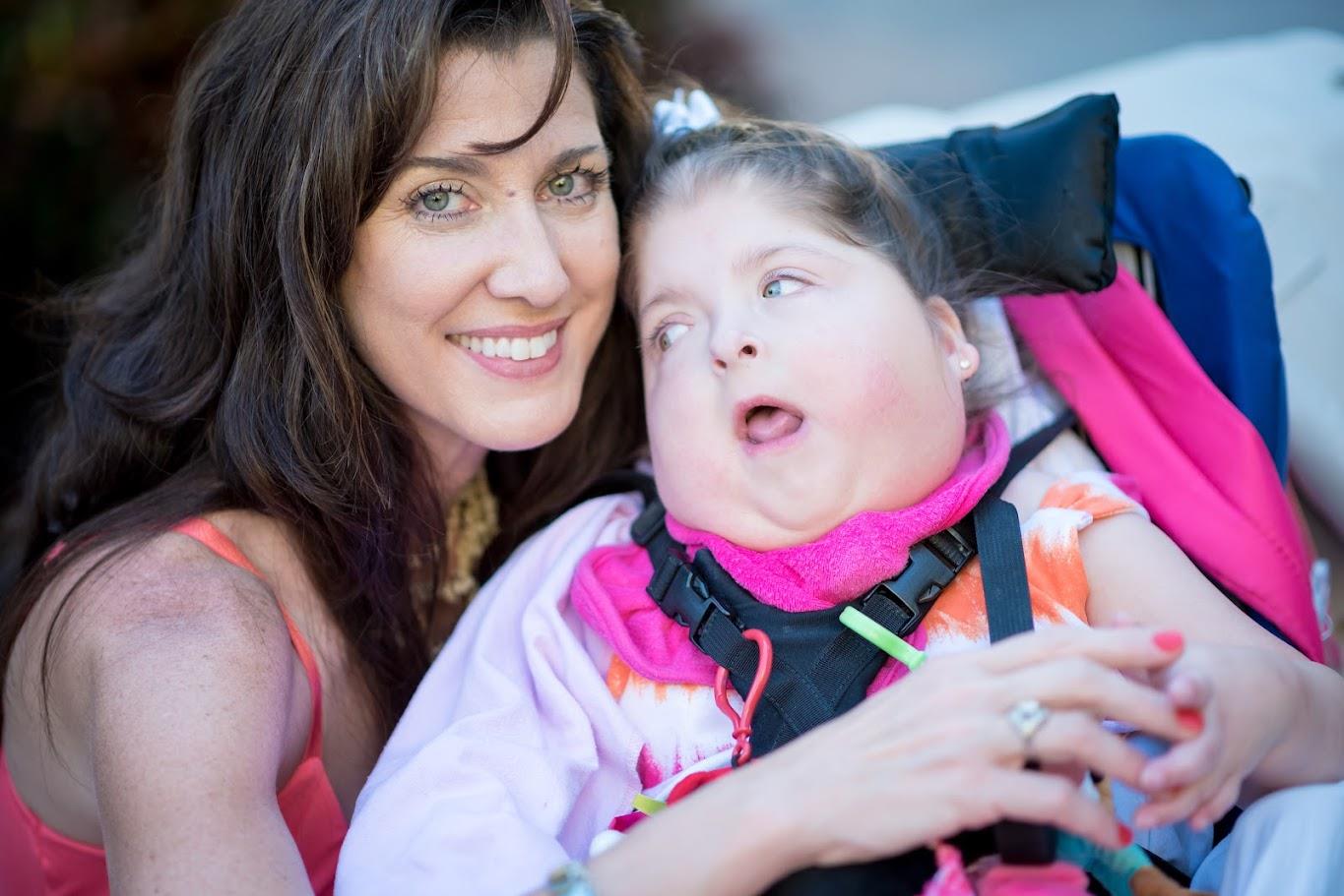 A woman holding a baby