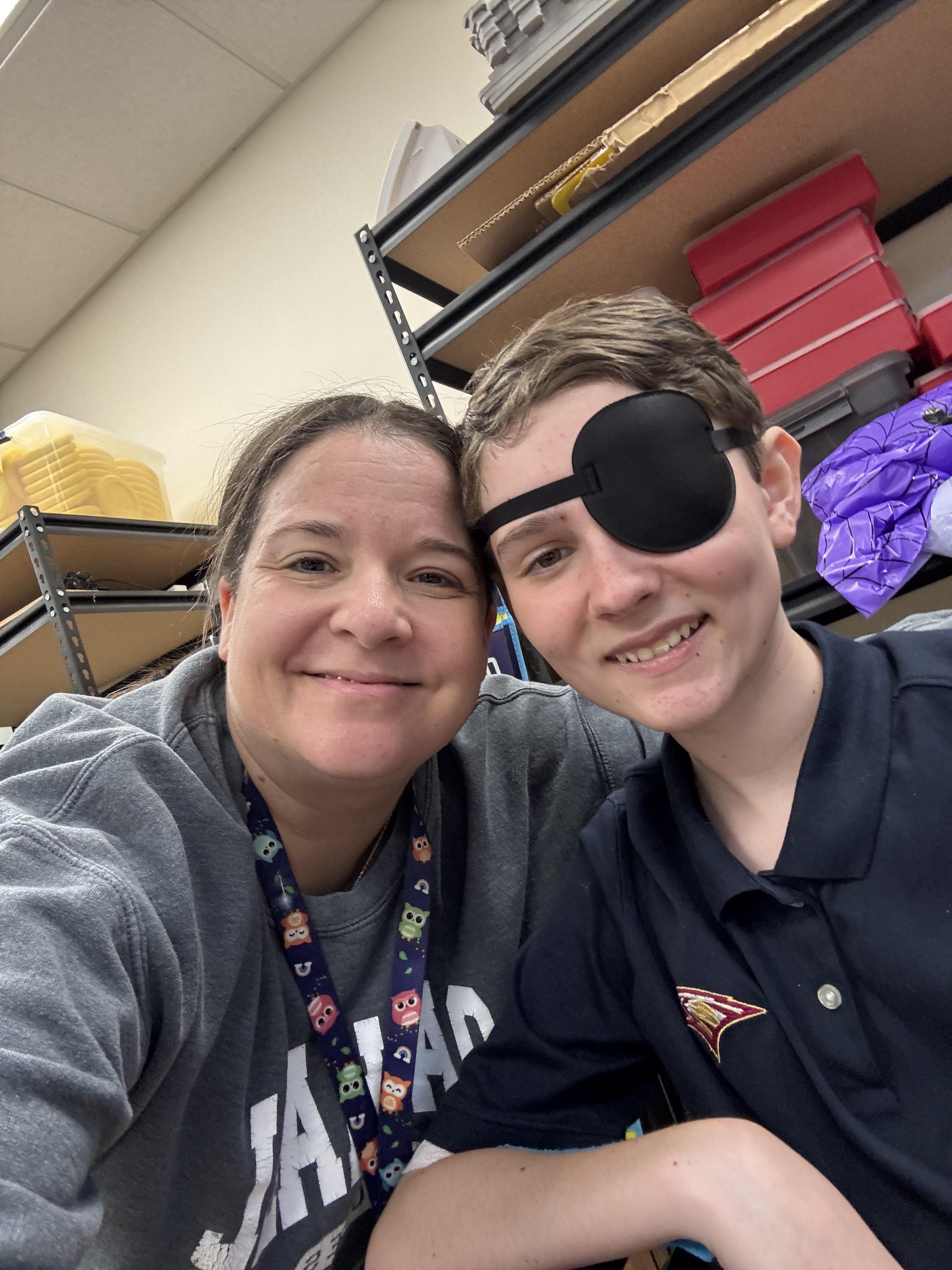 A woman and boy taking a selfie