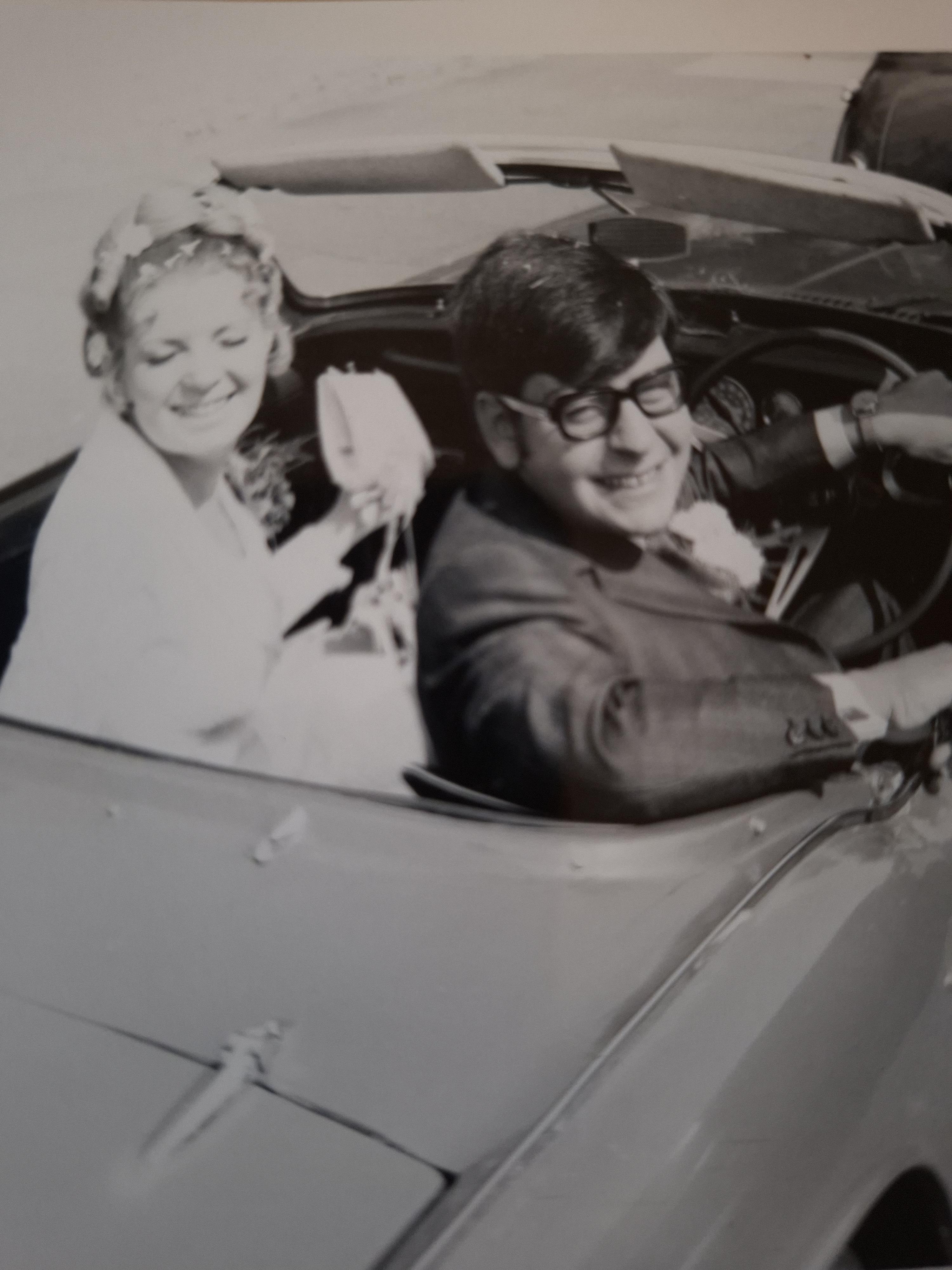 A man and woman in a car