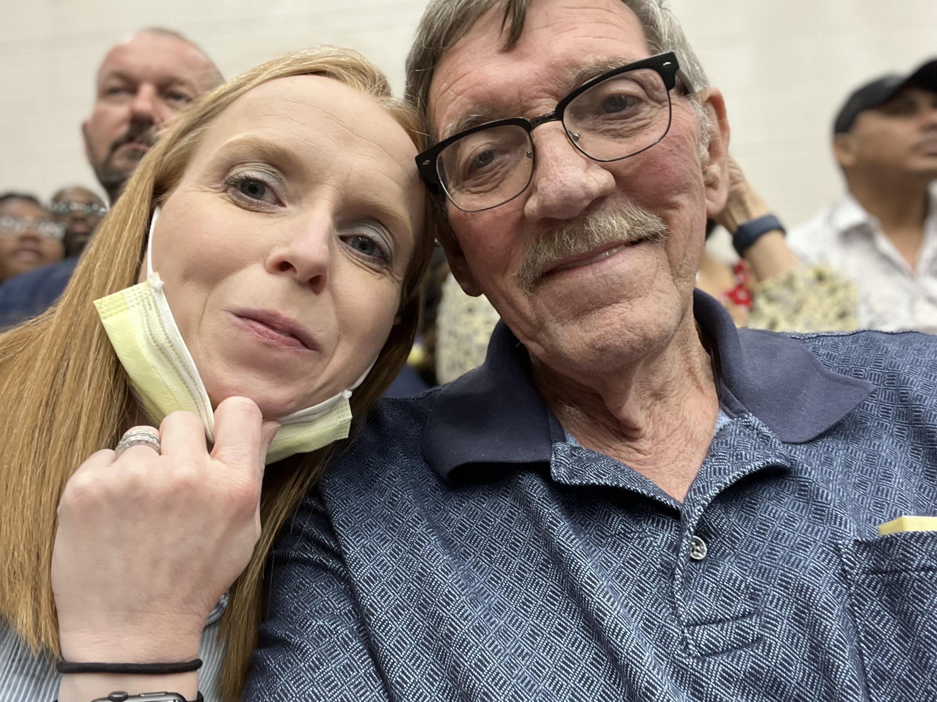 A man and woman taking a selfie