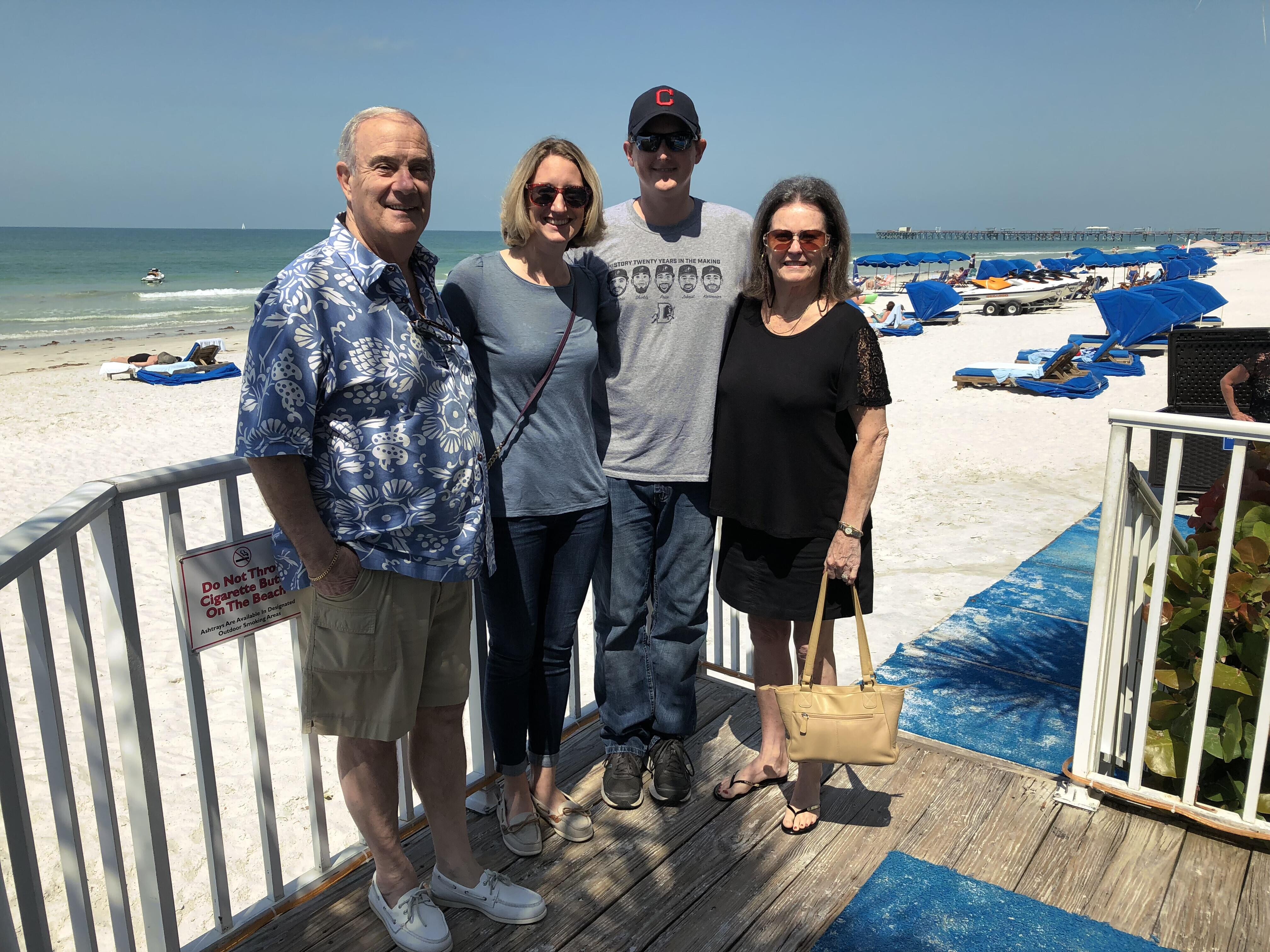 A group of people standing on a deck