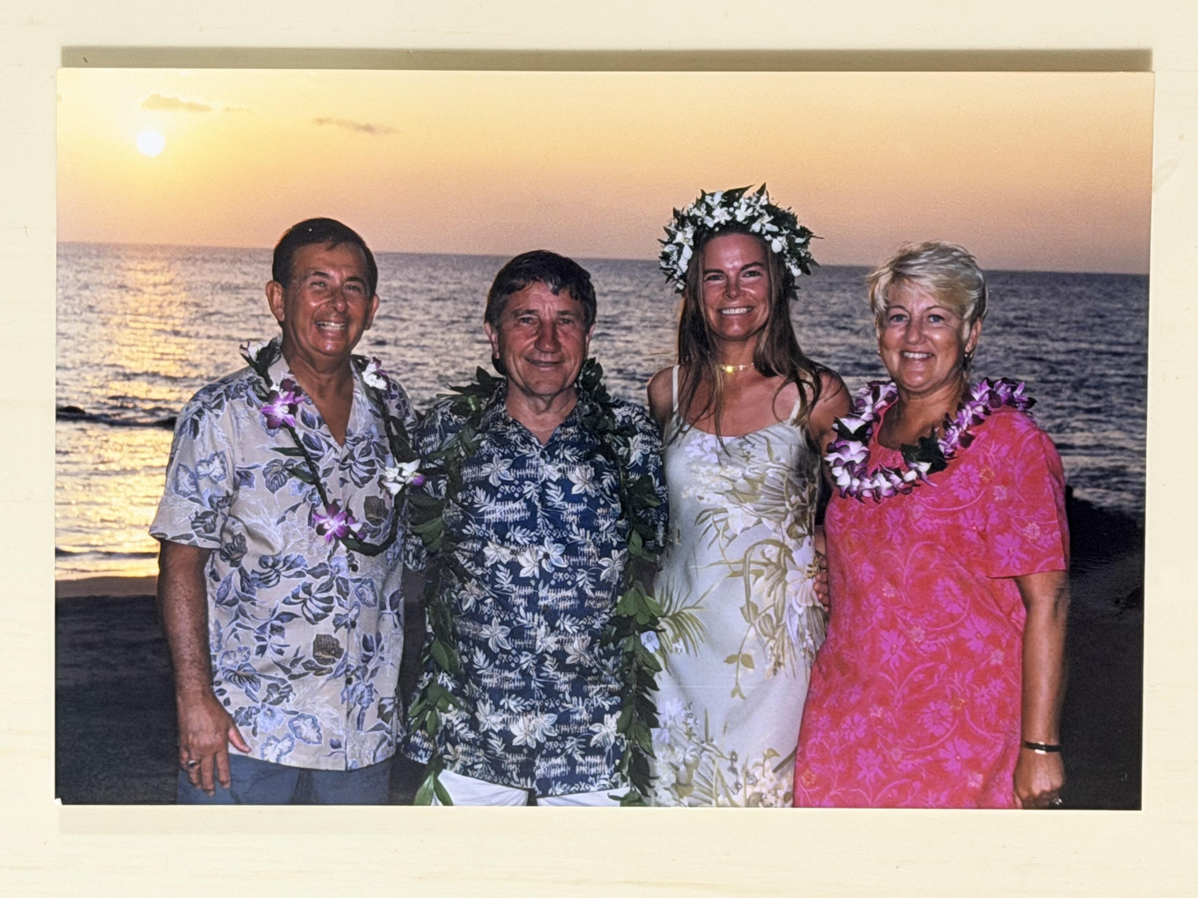 A group of people standing on a beach